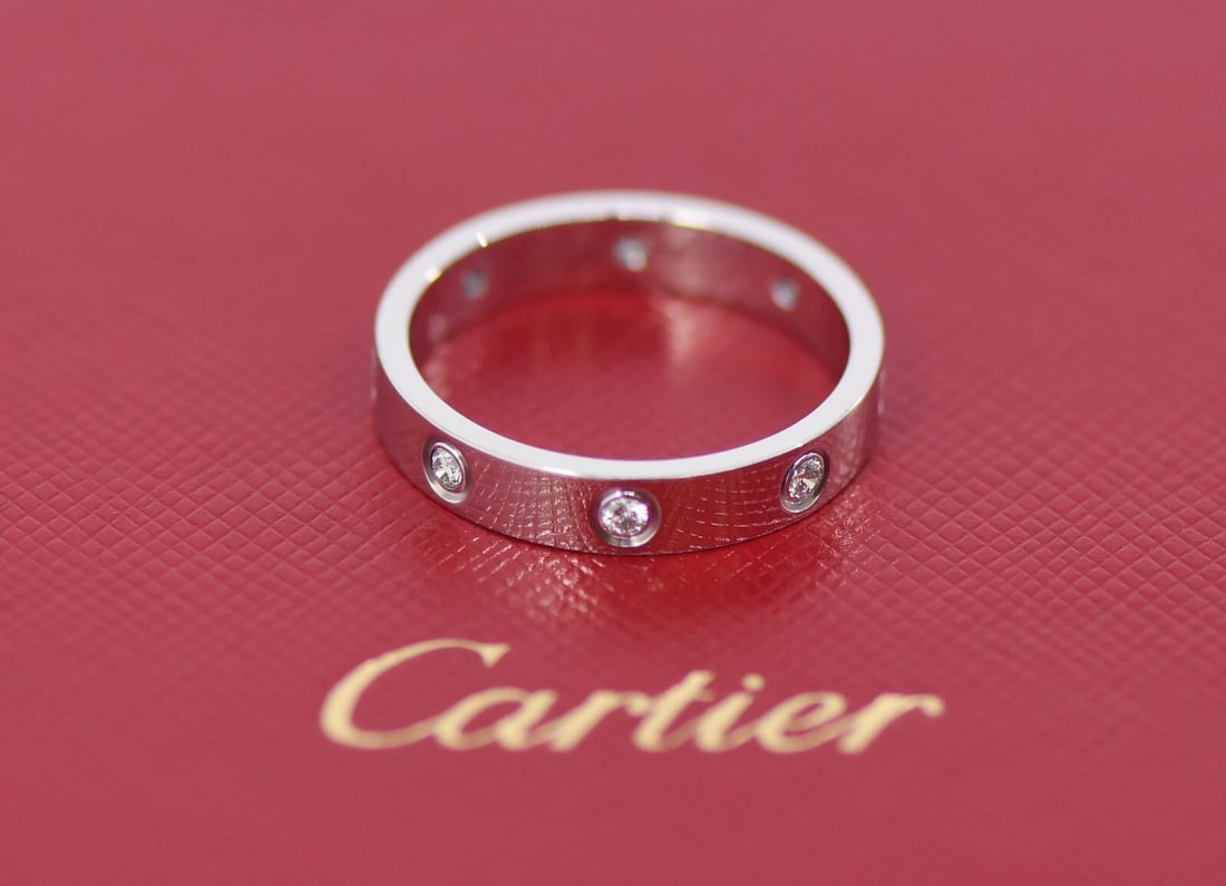 Cartier 18k White Gold Love Ring 8 Diamonds Size 58 Authentic: Cartier 18k White Gold Love Ring 8 Diamonds Size 58 Authentic This stunning Cartier Love Ring features 8 exquisite diamonds set in luxurious 18k white gold. Crafted with meticulous attention to detail