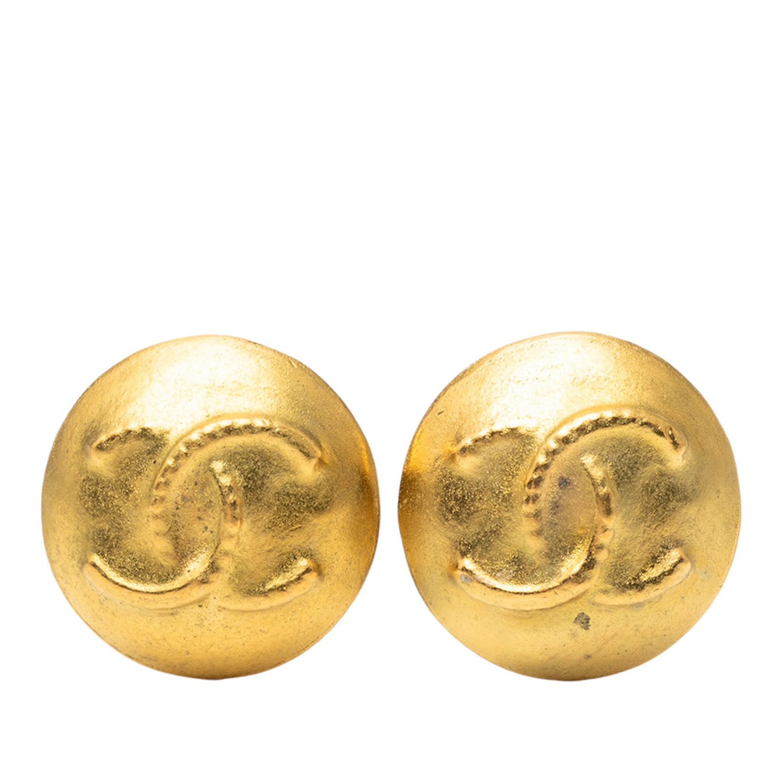 Chanel Button Clip Earrings Gold Plated CC Logo France: Chanel Button Clip Earrings Gold Plated CC Logo France These Chanel CC gold plated button earrings feature a classic gold tone metal design with clip-on back closures. Noted signs of wear include disc