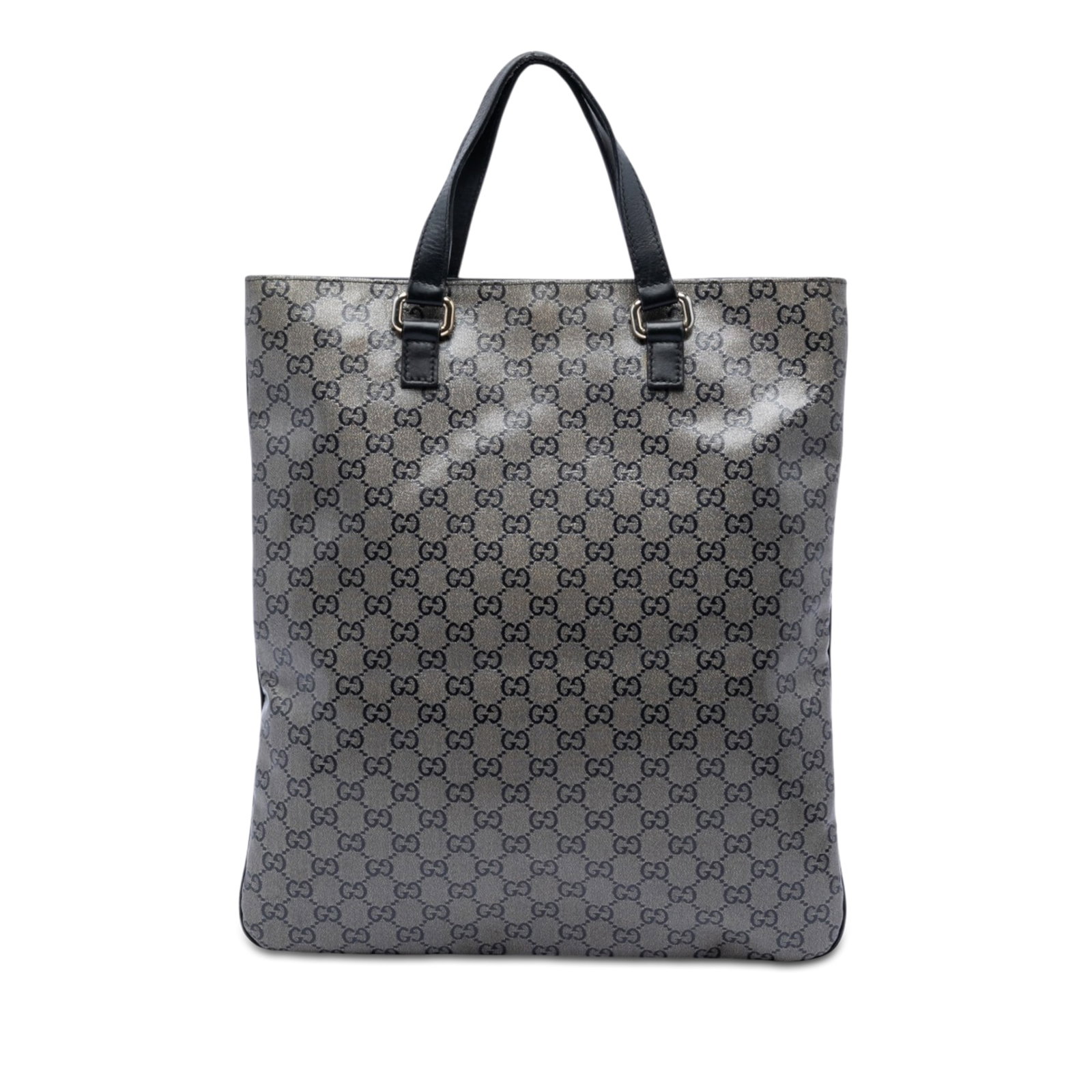 Gucci GG Crystal coated canvas tote bag: Gucci GG Crystal coated canvas tote bag This Gucci GG Crystal Tote is crafted from coated canvas with flat leather straps and features an open top with a magnetic closure. The interior is equipped wit
