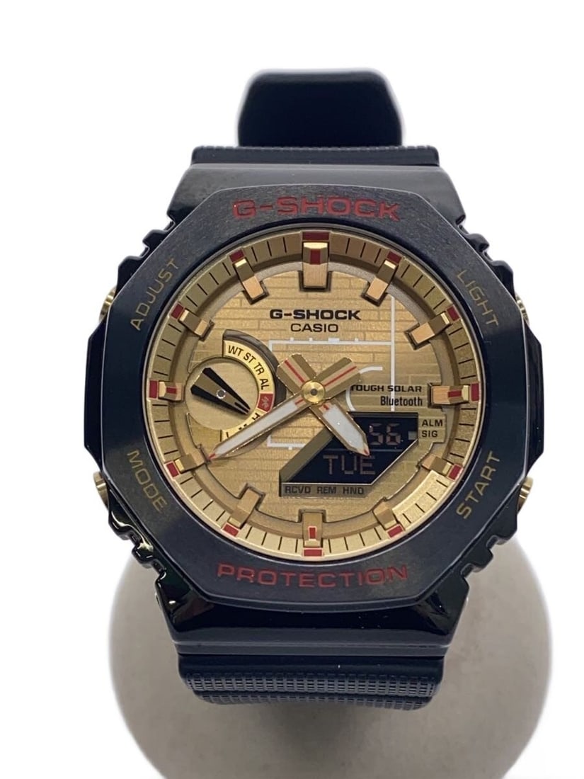 CASIO GBM-2100RH-1AJR Gold Rubber Men's Wristwatch: CASIO GBM-2100RH-1AJR Gold Rubber Men's Wristwatch This CASIO G-SHOCK GBM-2100RH-1AJR men's wristwatch features a durable rubber band and a gold-tone case. Made in Japan, this pre-owned watch is in sl