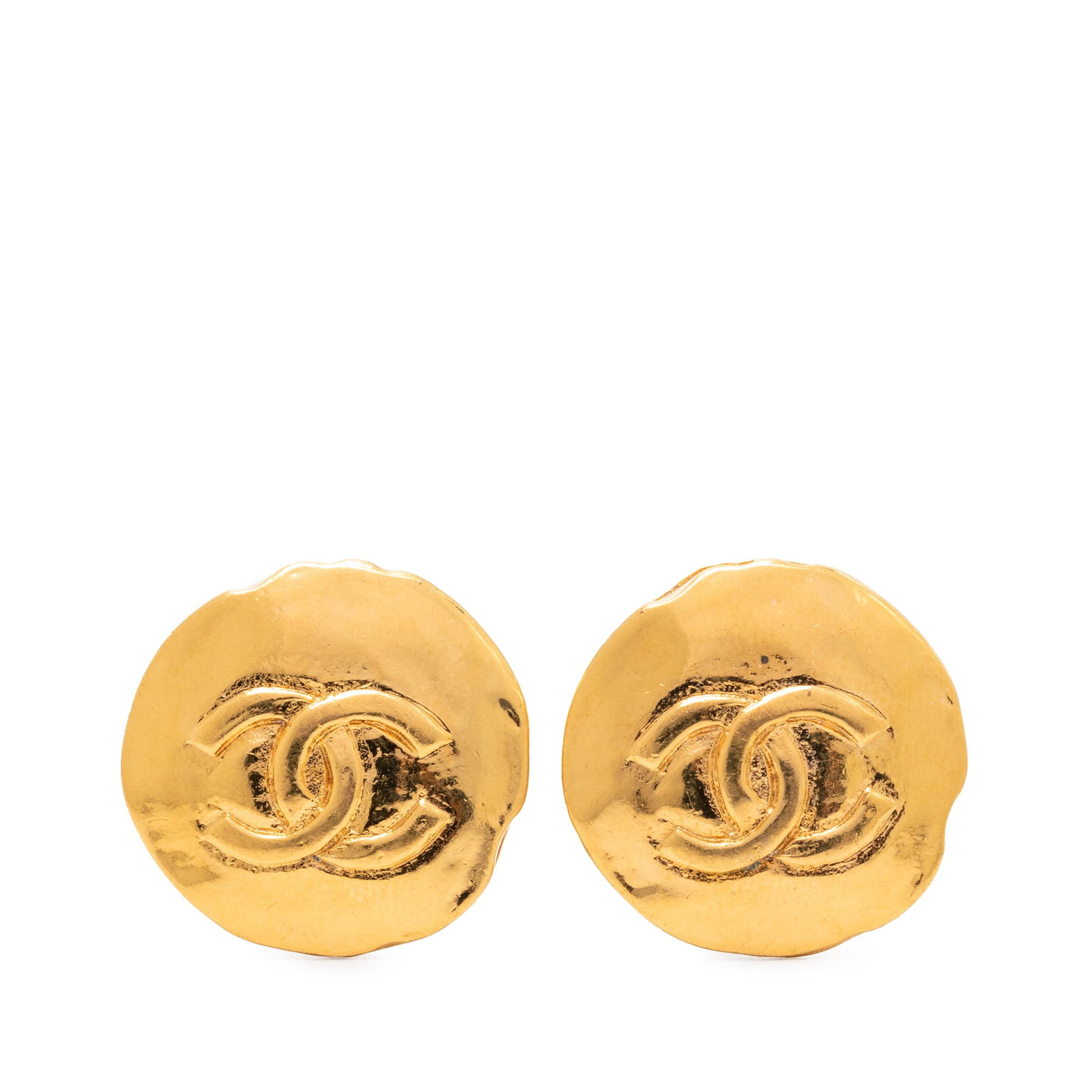 Chanel Round Gold Plated Clip On Earrings CC Logo: Chanel Round Gold Plated Clip On Earrings CC Logo These Chanel CC round clip-on earrings feature a gold plated metal body with clip-on closures. Designed as costume jewelry, they showcase the classic 