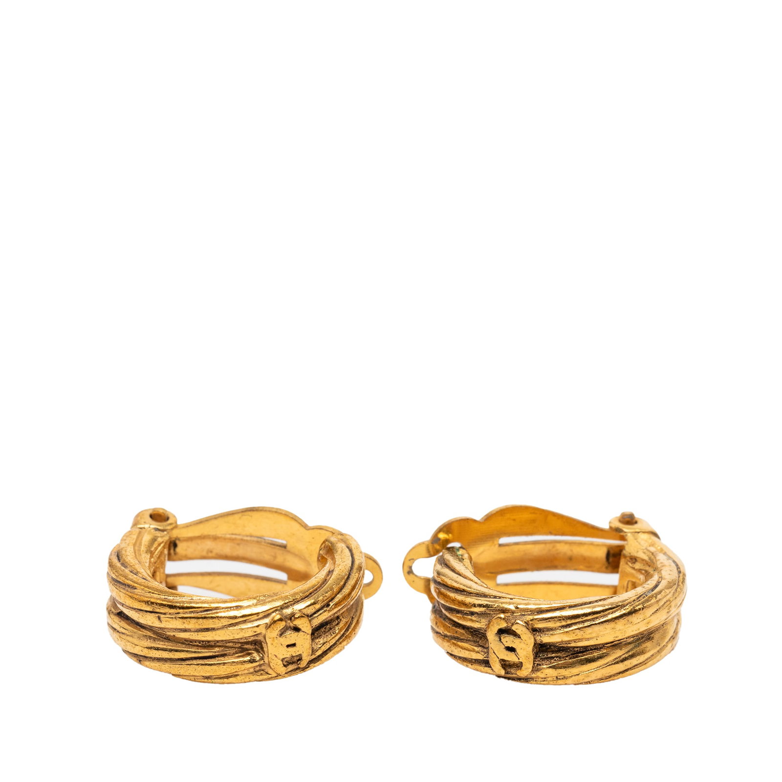 Chanel CC Logo Gold Plated Clip On Hoop Earrings: Chanel CC Logo Gold Plated Clip On Hoop Earrings These Chanel earrings feature gold-plated metal bodies with the iconic CC hoop design and secure back clip-on closures. Made in France, they are catego
