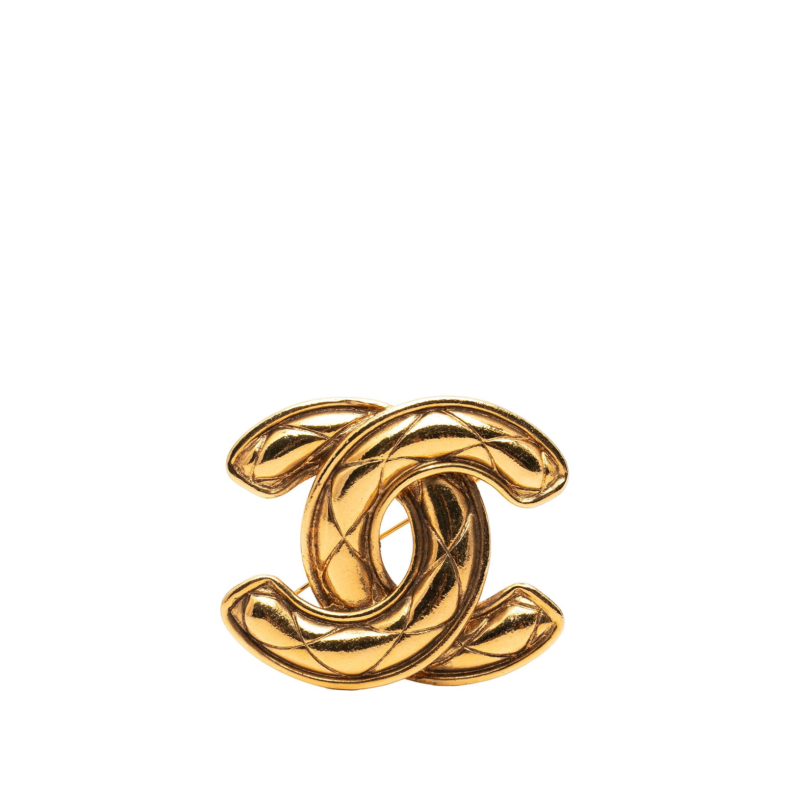Chanel CC Quilted Gold Tone Metal Brooch: Chanel CC Quilted Gold Tone Metal Brooch This Chanel CC Gold Plated Quilted Brooch features a gold-tone metal body with a signature quilted design and a secure back pin closure. The brooch is crafted 