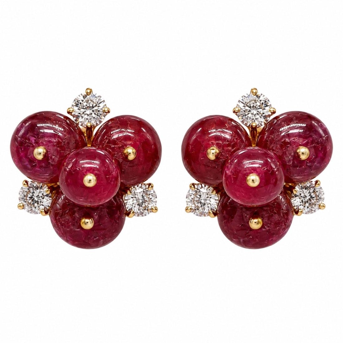 Olga Tritt 18K Gold Ruby Diamond Earrings 1960s: Olga Tritt 18K Gold Ruby Diamond Earrings 1960s These 1960's earrings by Olga Tritt feature a luxurious combination of 18K yellow gold, vibrant rubies, and sparkling diamonds. The earrings are set wit