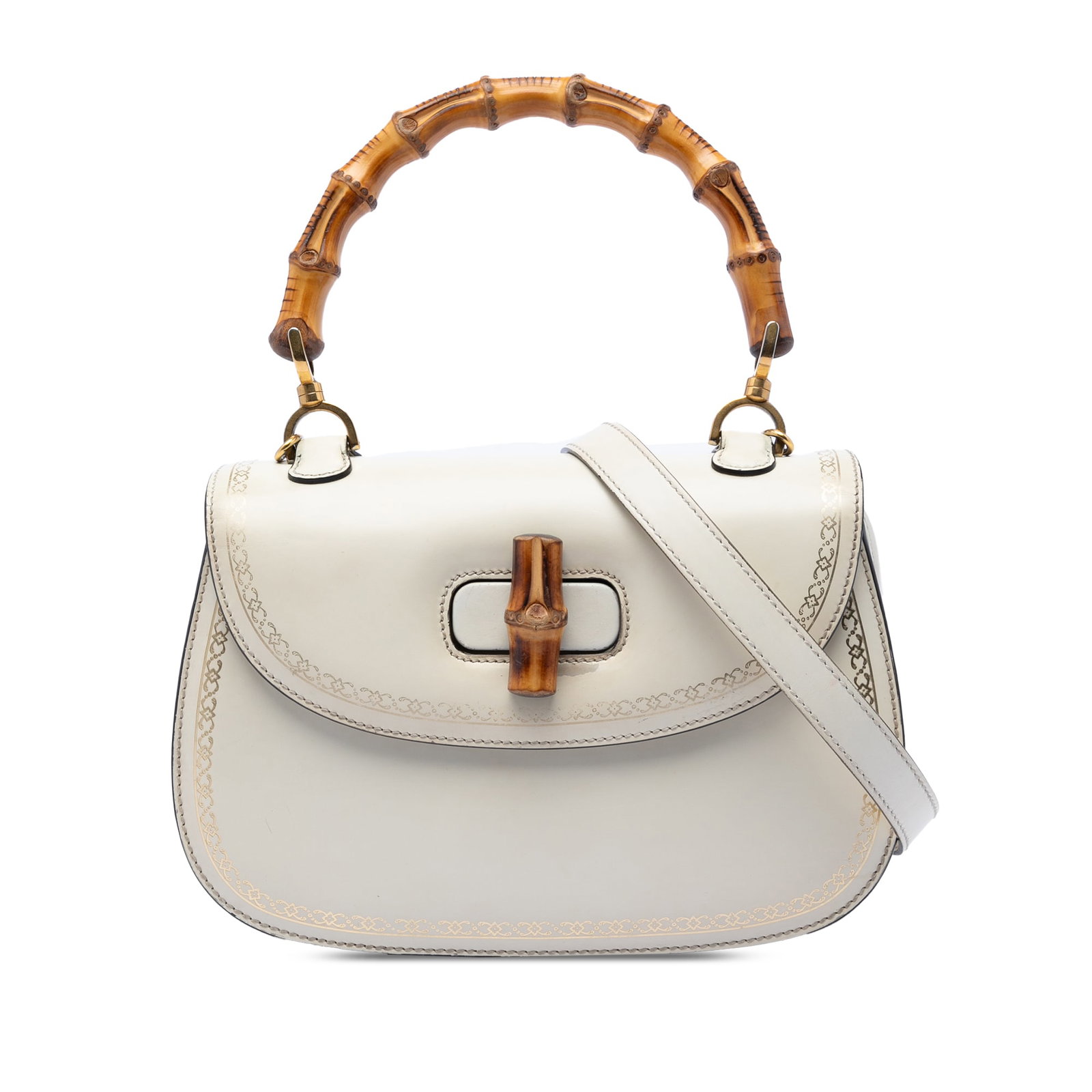 Gucci bamboo top handle leather satchel with detachable strap: Gucci bamboo top handle leather satchel with detachable strap This Gucci Calfskin Frame Print Bamboo Top Handle Bag features a printed leather exterior in white, accented with a signature bamboo top h