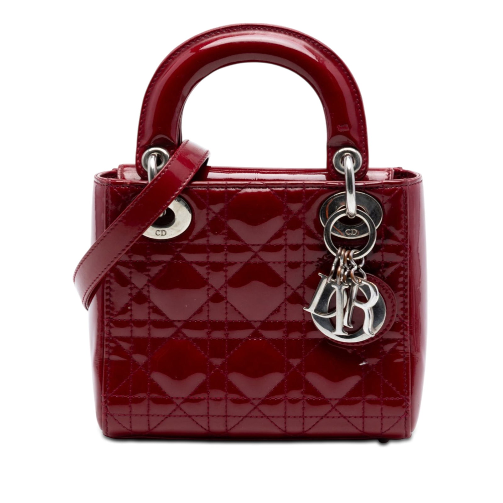 Dior Mini Patent Cannage Lady Bag Red Leather: Dior Mini Patent Cannage Lady Bag Red Leather This Mini Patent Cannage Lady Dior bag showcases Dior's signature quilted patent leather in a striking red hue. It features flat leather top handles, a de