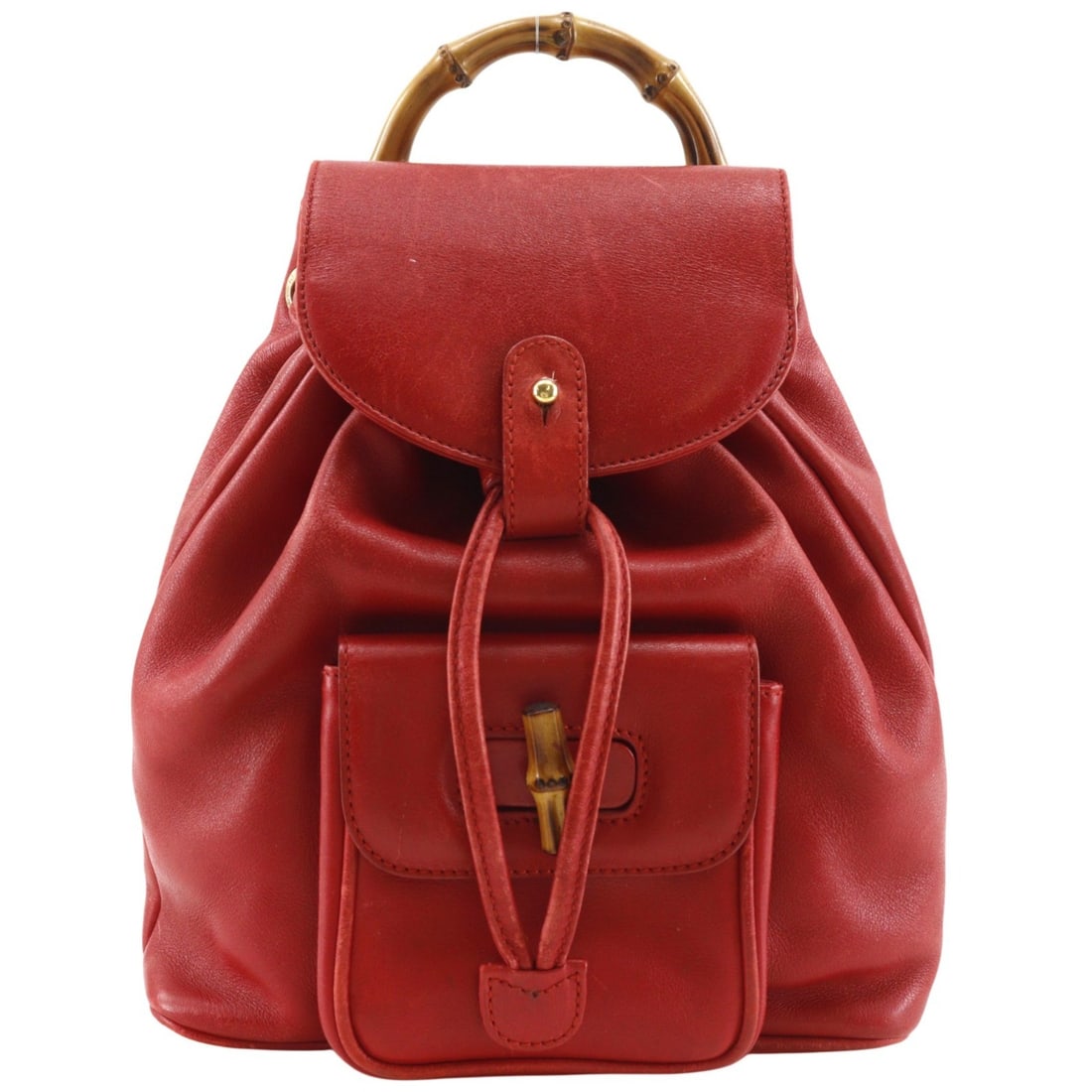 Gucci Vintage Bamboo Red Leather Backpack: Gucci Vintage Bamboo Red Leather Backpack This Gucci Vintage Bamboo Backpack is crafted from red leather and features the brand's iconic bamboo handle. Designed for women, it offers a stylish and func