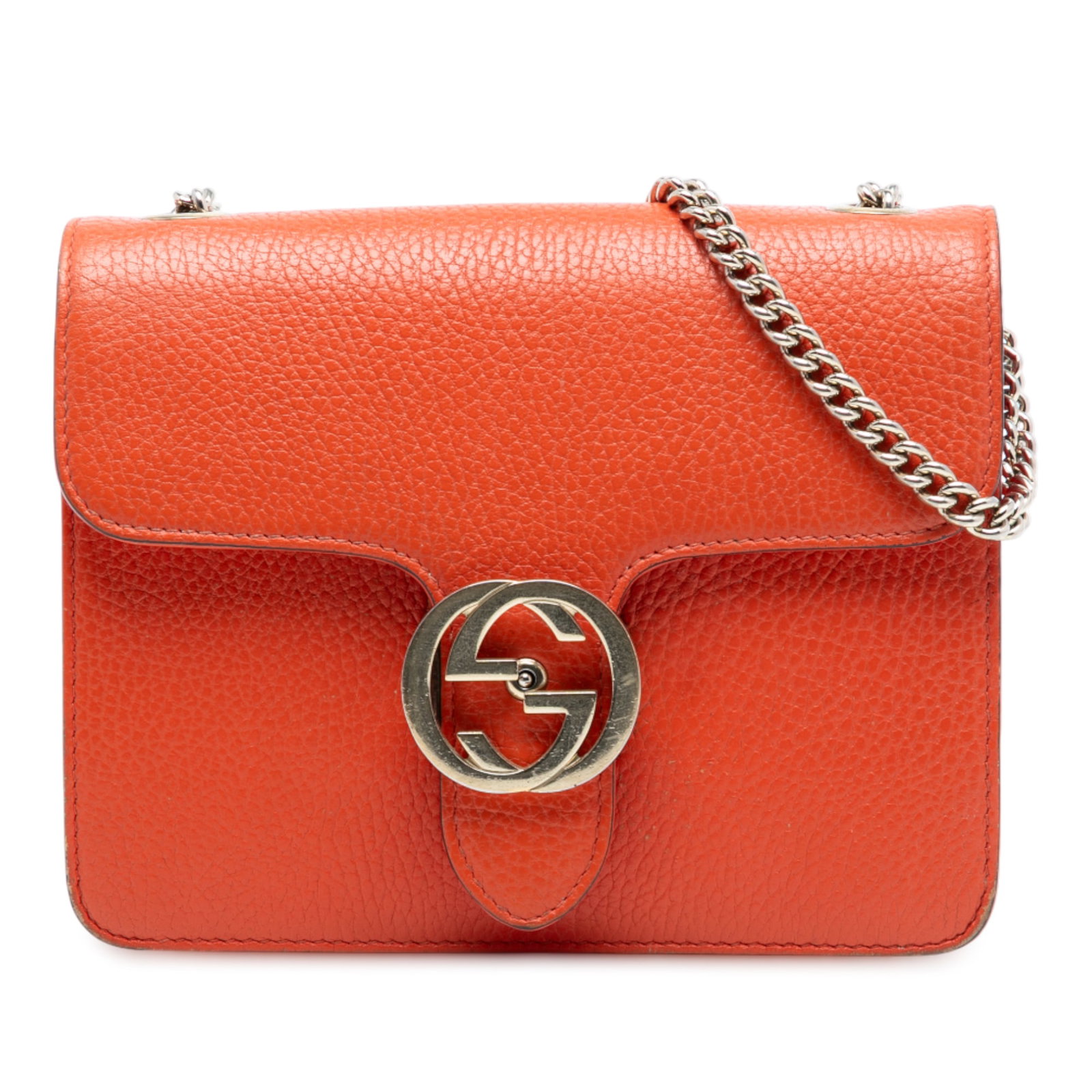 Gucci Interlocking G Small Orange Leather Crossbody Bag with Chain Strap: Gucci Interlocking G Small Orange Leather Crossbody Bag with Chain Strap This orange leather crossbody bag features a chain-link shoulder strap with a leather shoulder guard, a front flap with a silve