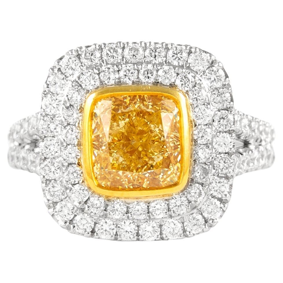 2.32ct Fancy Yellow Diamond Halo Ring 18k Gold GIA Certified: 2.32ct Fancy Yellow Diamond Halo Ring 18k Gold GIA Certified This exquisite GIA certified ring features a stunning 2.32 ct Fancy Yellow VS2 cushion cut diamond at its center, surrounded by a dazzling 