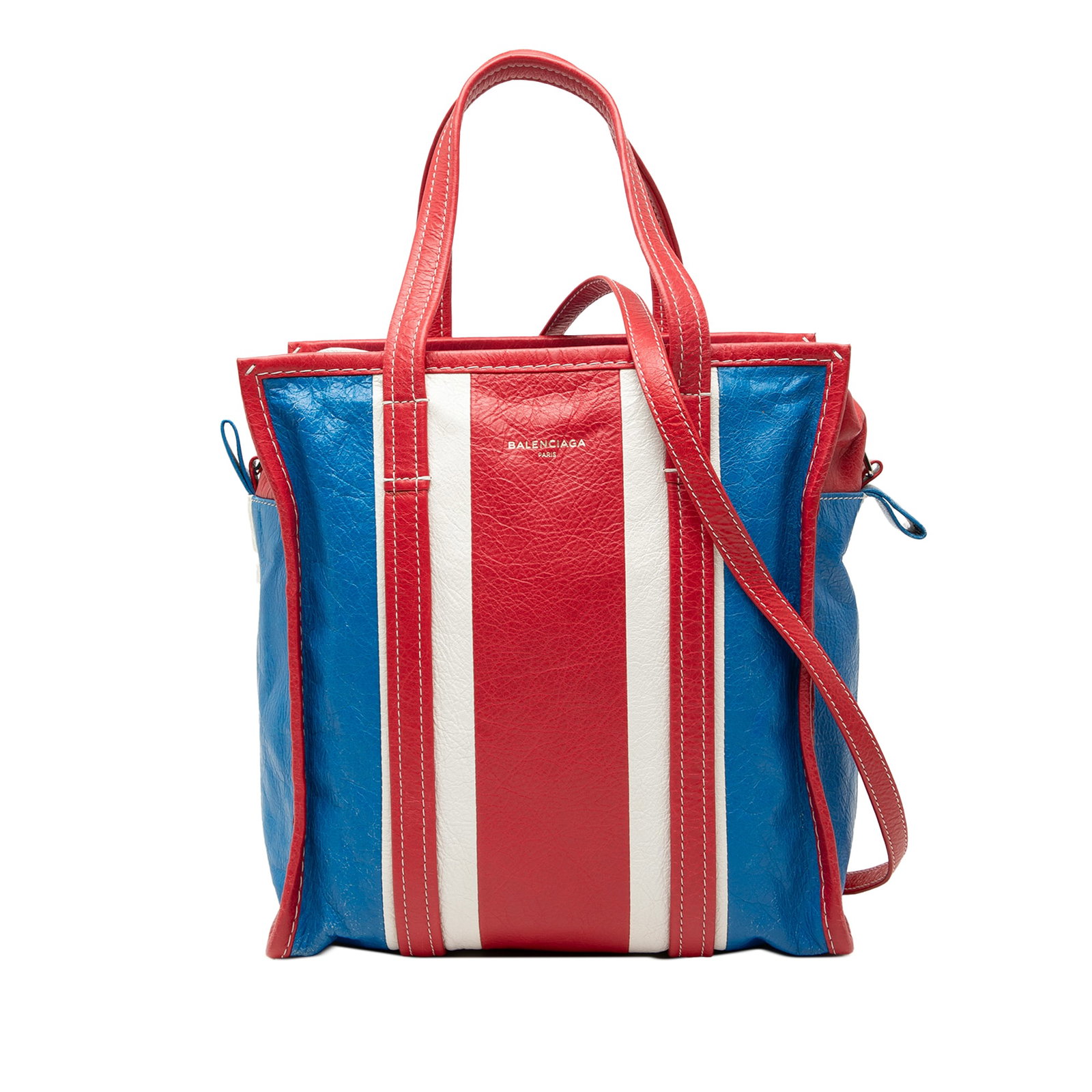 Balenciaga Bazar Shopper Tote S Lambskin Leather Red: Balenciaga Bazar Shopper Tote S Lambskin Leather Red This Balenciaga S Lambskin Bazar Shopper Tote is crafted from leather and features flat handles, an adjustable and detachable shoulder strap, a two