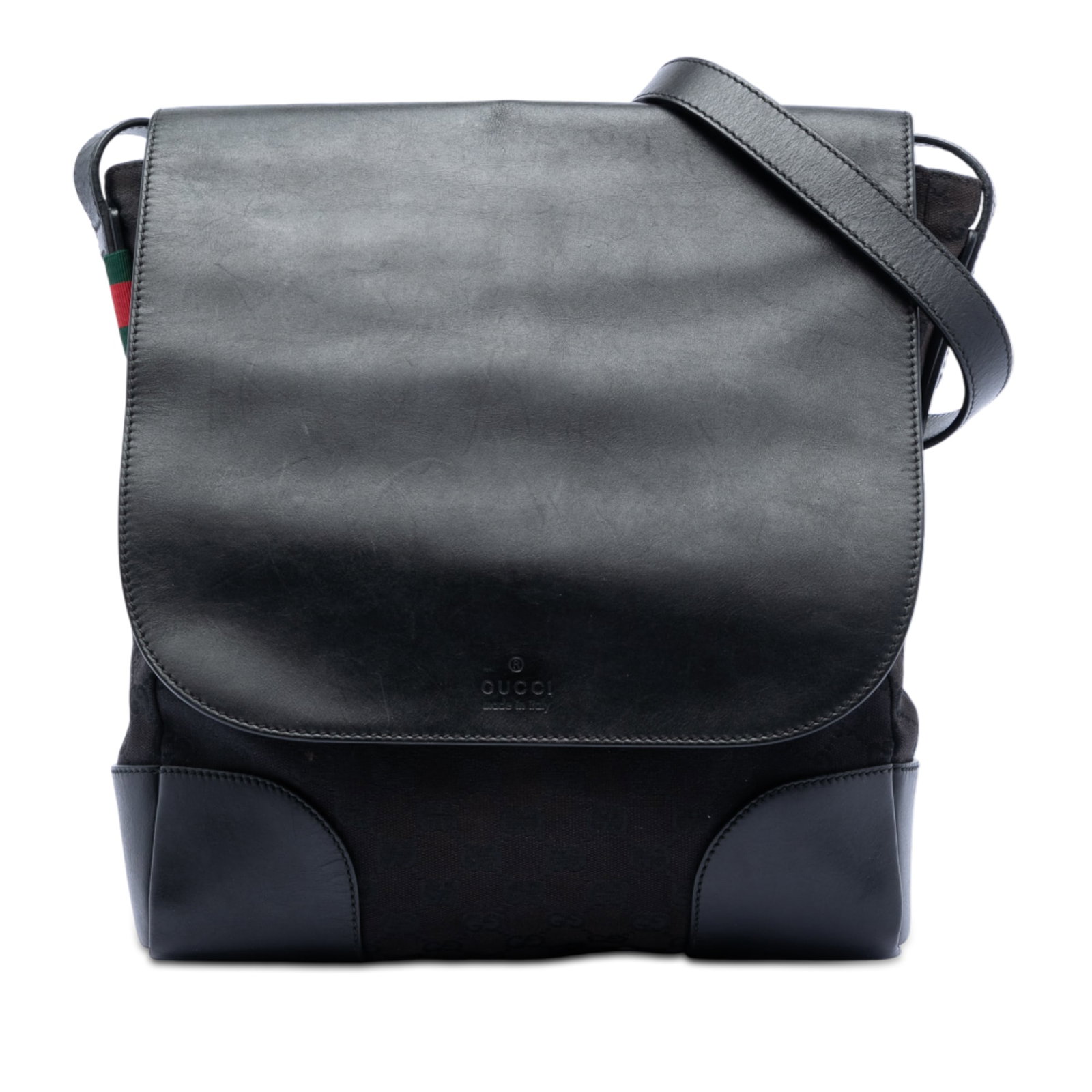 Gucci GG Canvas Black Crossbody Bag with Leather Trim Adjustable Strap: Gucci GG Canvas Black Crossbody Bag with Leather Trim Adjustable Strap This Gucci GG Canvas and Leather Crossbody bag features a canvas and leather exterior in black, an adjustable flat leather strap,