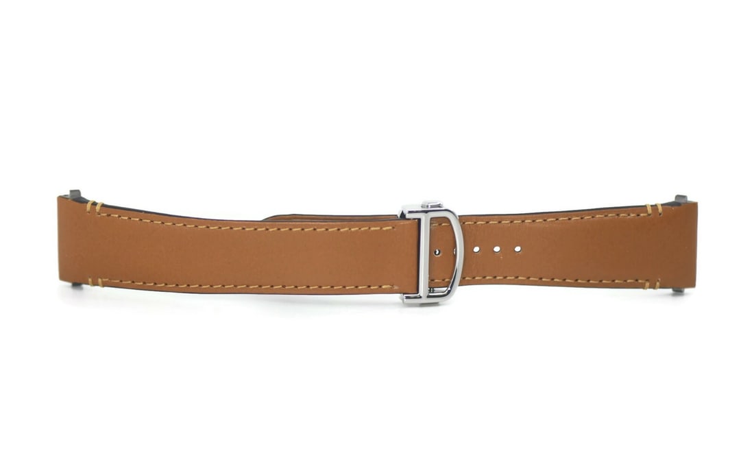 Cartier Authentic Brown Leather Wristwatch Strap 21mm: Cartier Authentic Brown Leather Wristwatch Strap 21mm This genuine Cartier brown leather strap is designed for wristwatches, featuring a width of 21 mm. The band is crafted from high-quality leather, 