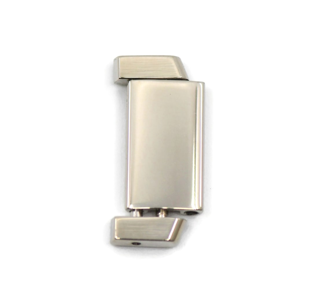 Cartier 18K White Gold Tank Band Link 19mm: Cartier 18K White Gold Tank Band Link 19mm This Cartier Tank band link is crafted from 18K white gold and measures 19mm in width. Made in Switzerland, it is designed as a replacement or addition for C