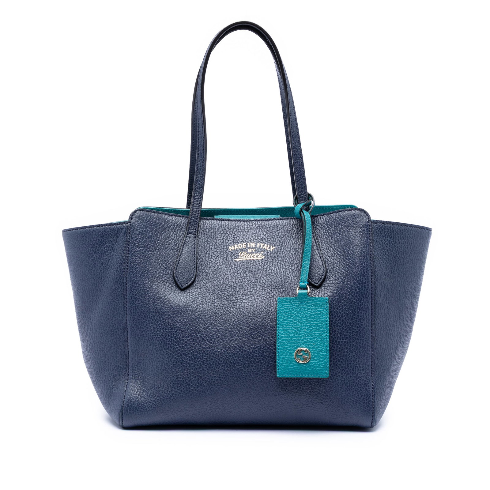 Gucci Swing Tote Medium Blue Leather Handbag Italy: Gucci Swing Tote Medium Blue Leather Handbag Italy This Gucci Medium Dollar Calfskin Swing Tote features a blue leather body with flat leather straps, an open top secured by a magnetic snap closure, a