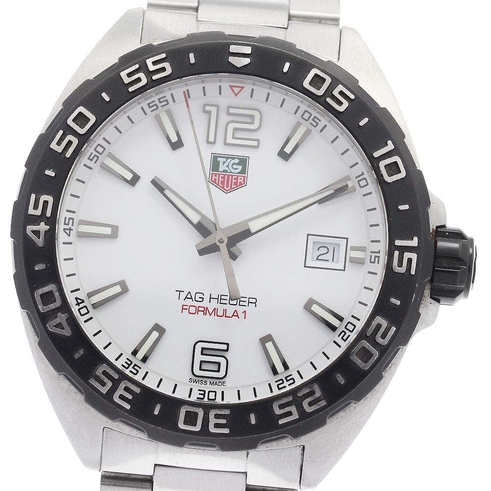 TAG Heuer Formula 1 WAZ1111 Quartz Date Steel Men's Watch: TAG Heuer Formula 1 WAZ1111 Quartz Date Steel Men's Watch This TAG Heuer Formula 1 Date Quartz men's wristwatch features a stainless steel case and bracelet with a white dial. The watch is powered by 