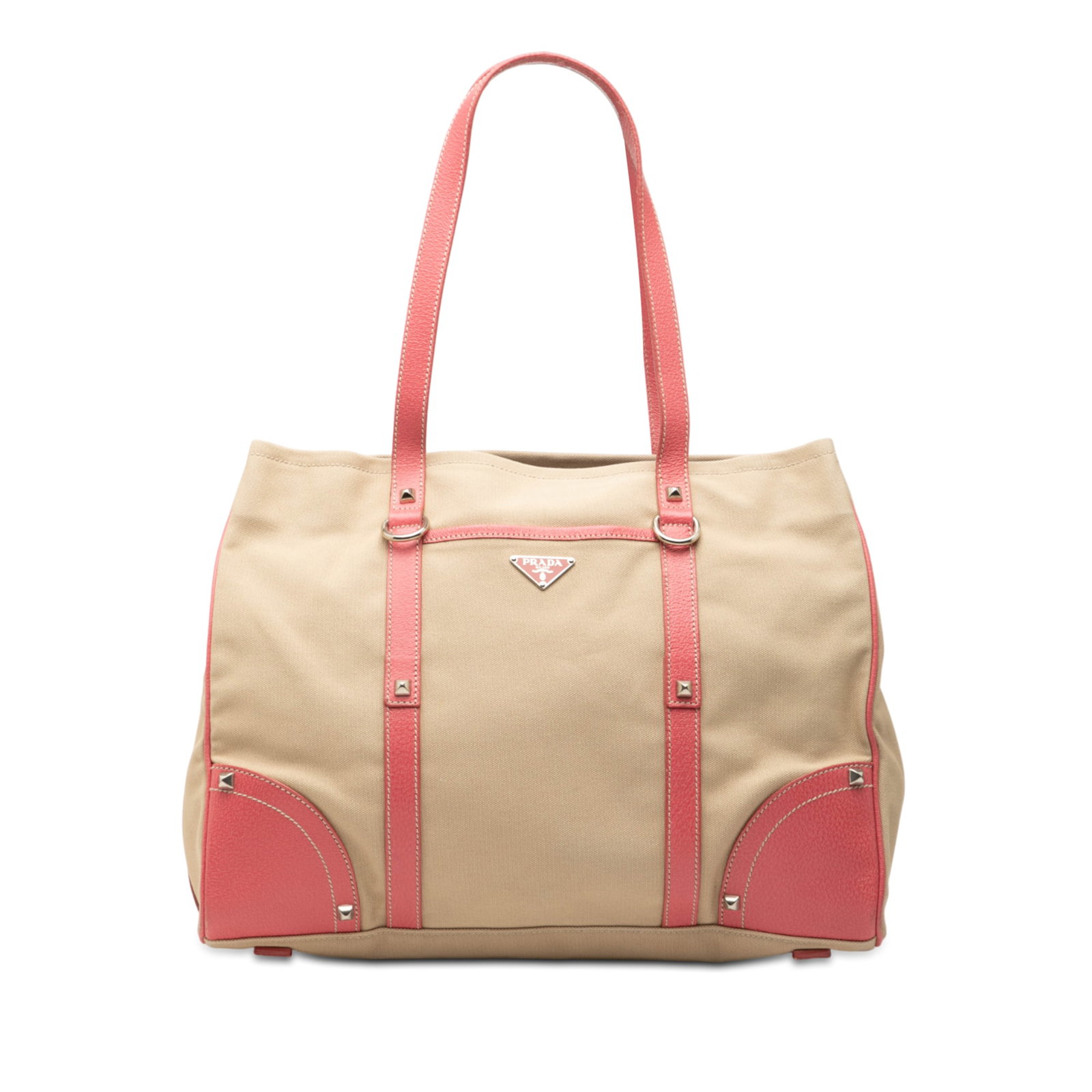 Prada Canvas Tote with Leather Accents and Stud Embellishments: Prada Canvas Tote with Leather Accents and Stud Embellishments This Prada Studded Leather Trimmed Canvas Front Pocket Tote features a beige canvas body with leather trim, flat leather handles, an open