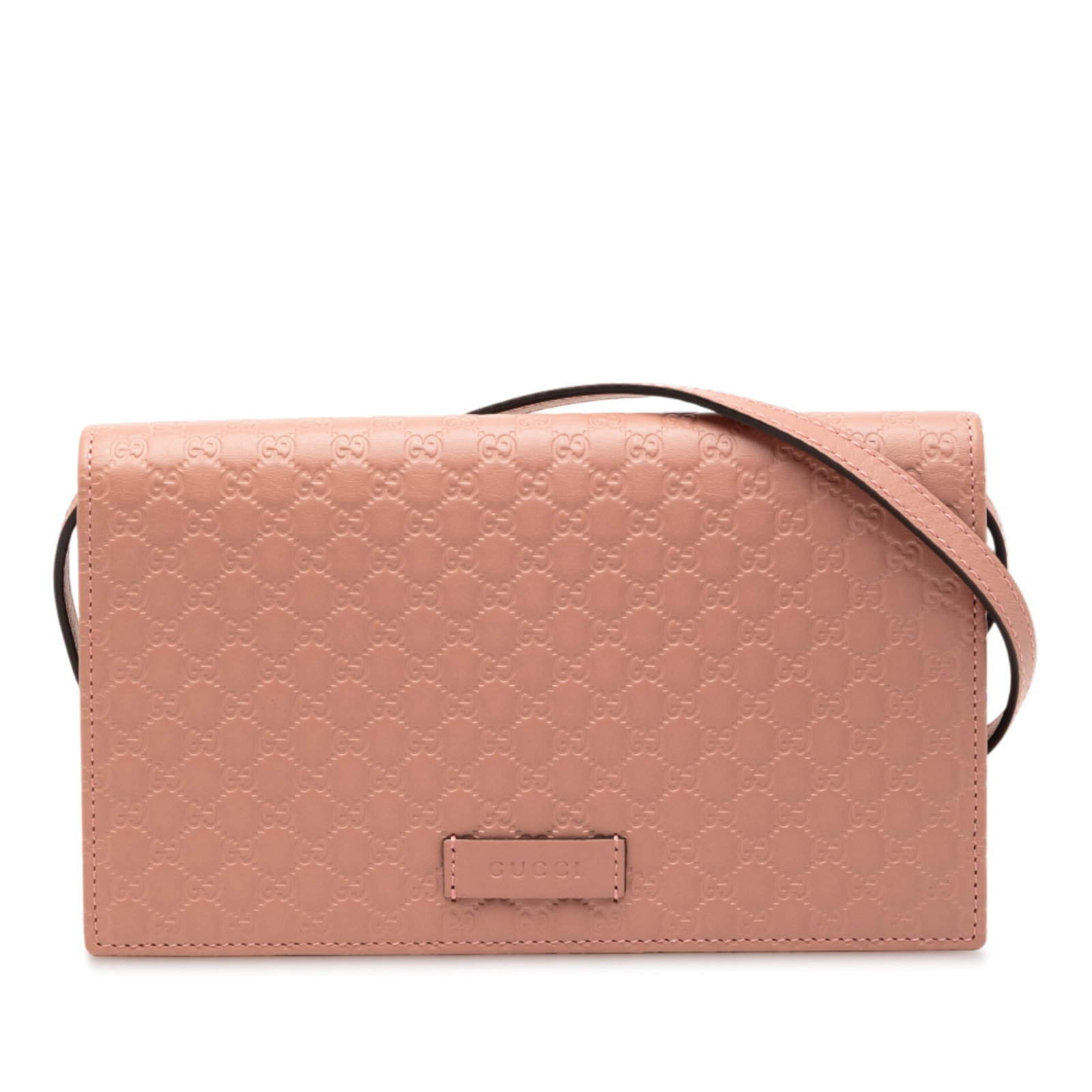 Gucci Pink Leather Microguccissima Crossbody Wallet Bag: Gucci Pink Leather Microguccissima Crossbody Wallet Bag This Gucci Microguccissima Wallet on Strap is crafted from embossed leather in a pink hue. The design features a flat leather strap, a front fla