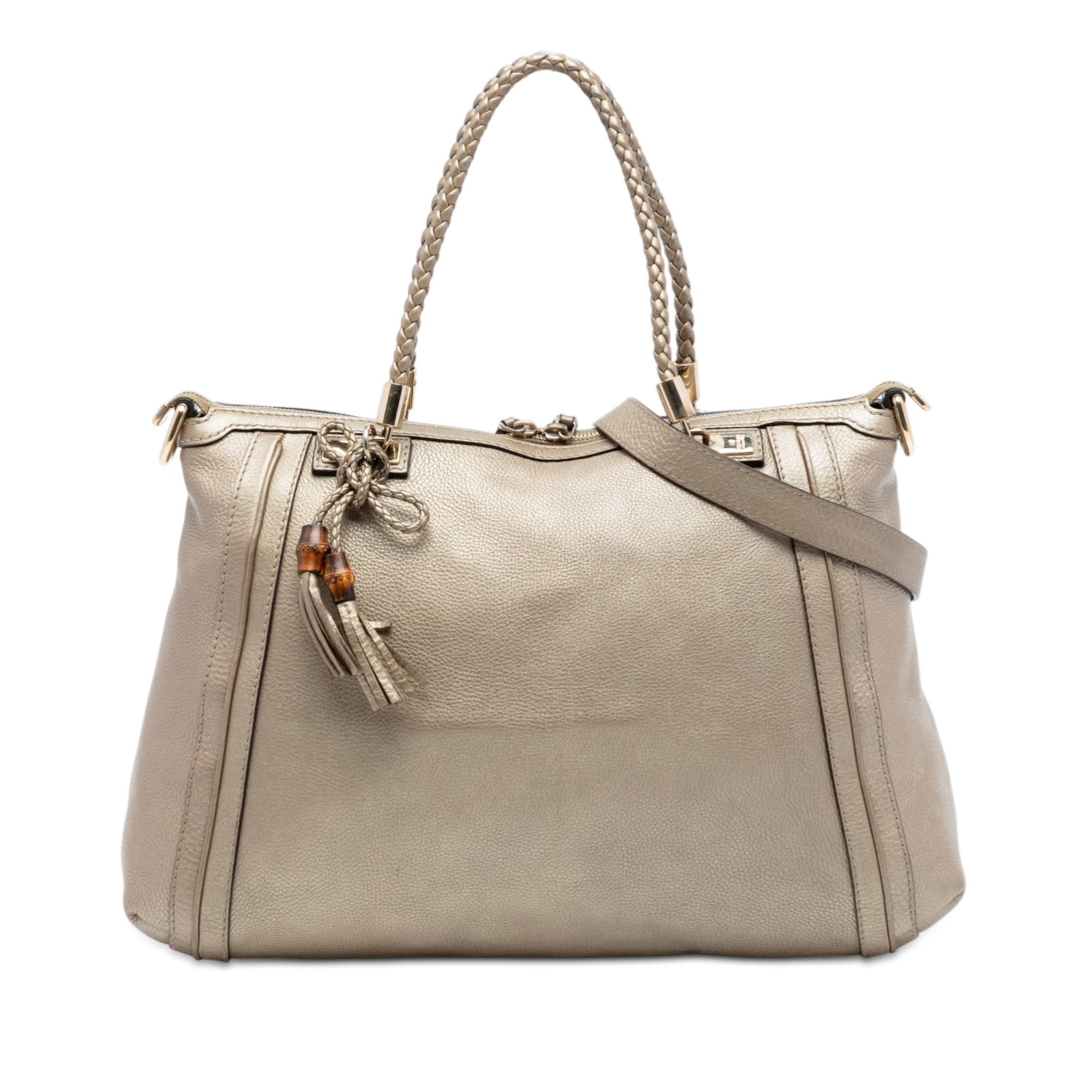 Gucci Bella Gold Leather Tote with Braided Handles and Bamboo Tassels: Gucci Bella Gold Leather Tote with Braided Handles and Bamboo Tassels The Gucci Large Leather Bella Tote features a leather body with braided leather handles accented by bamboo tassel details. It incl