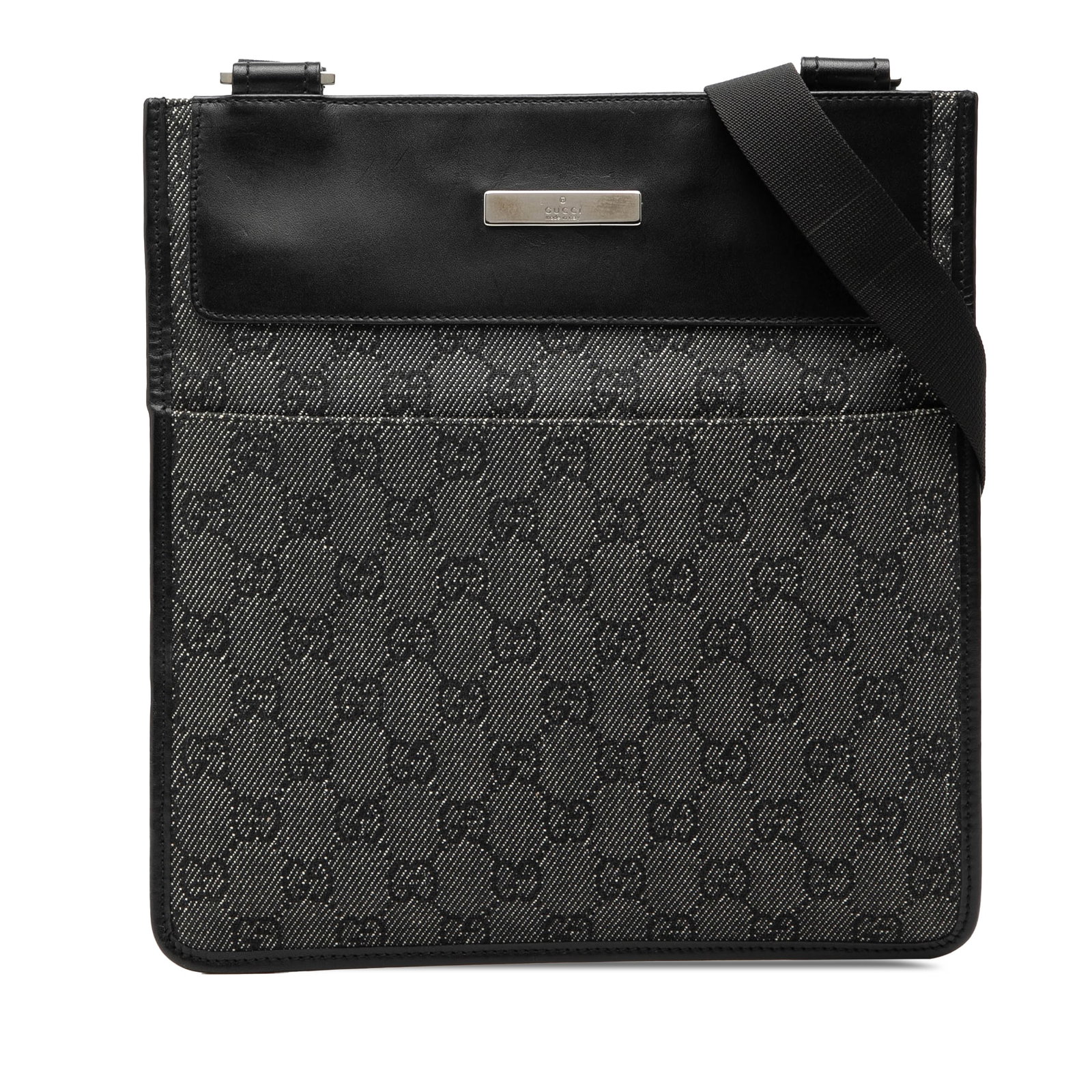 Gucci GG Denim Shoulder Bag with Leather Trim and Exterior Pockets: Gucci GG Denim Shoulder Bag with Leather Trim and Exterior Pockets This Gucci GG Denim Crossbody bag showcases a denim body with leather trim, featuring both front and back exterior slip pockets. It i