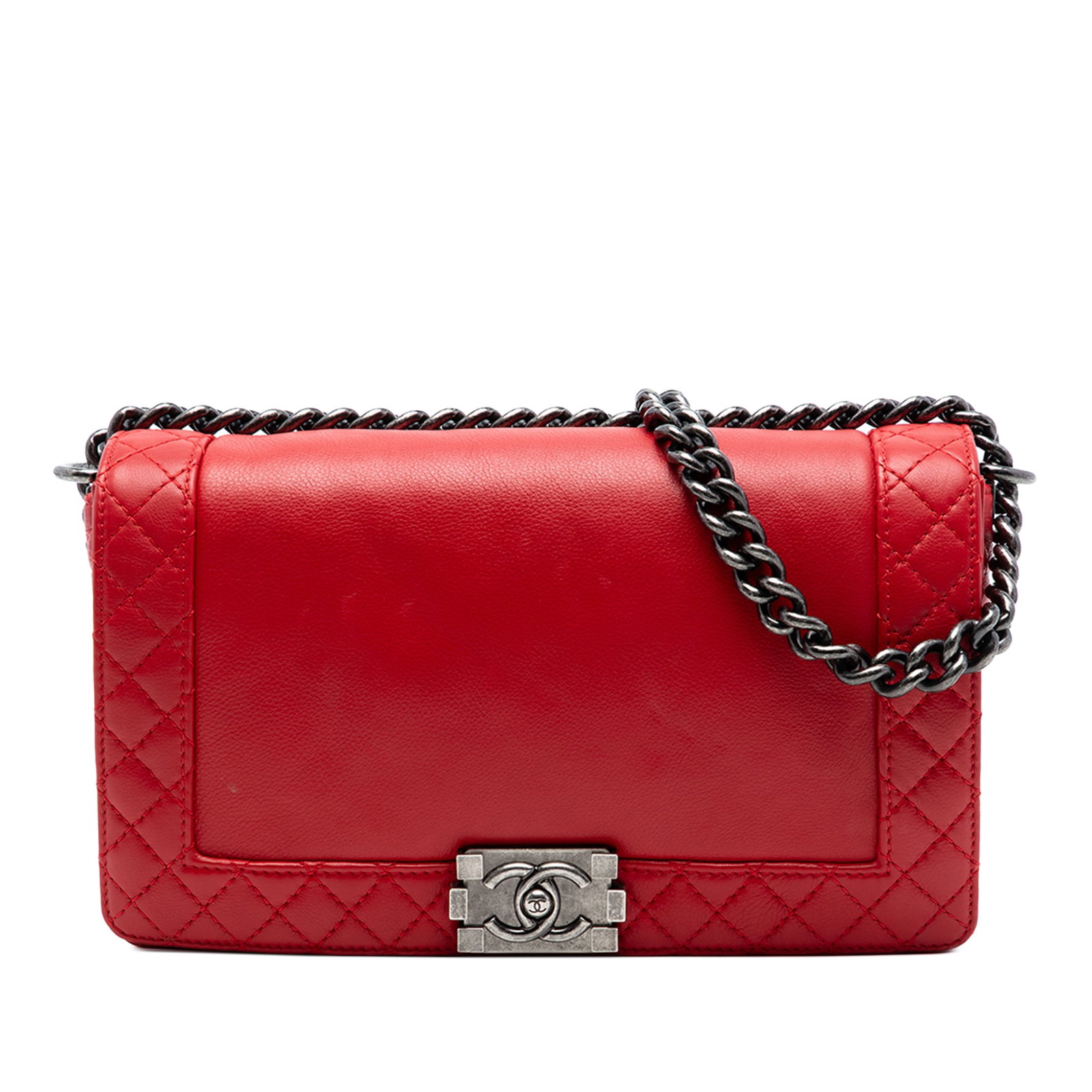 Chanel Boy Reverso red calfskin crossbody flap bag: Chanel Boy Reverso red calfskin crossbody flap bag This Chanel Old Medium Calfskin Boy Reverso Flap crossbody bag is crafted in red calf leather and features a silver-tone chain strap, a front flap wi