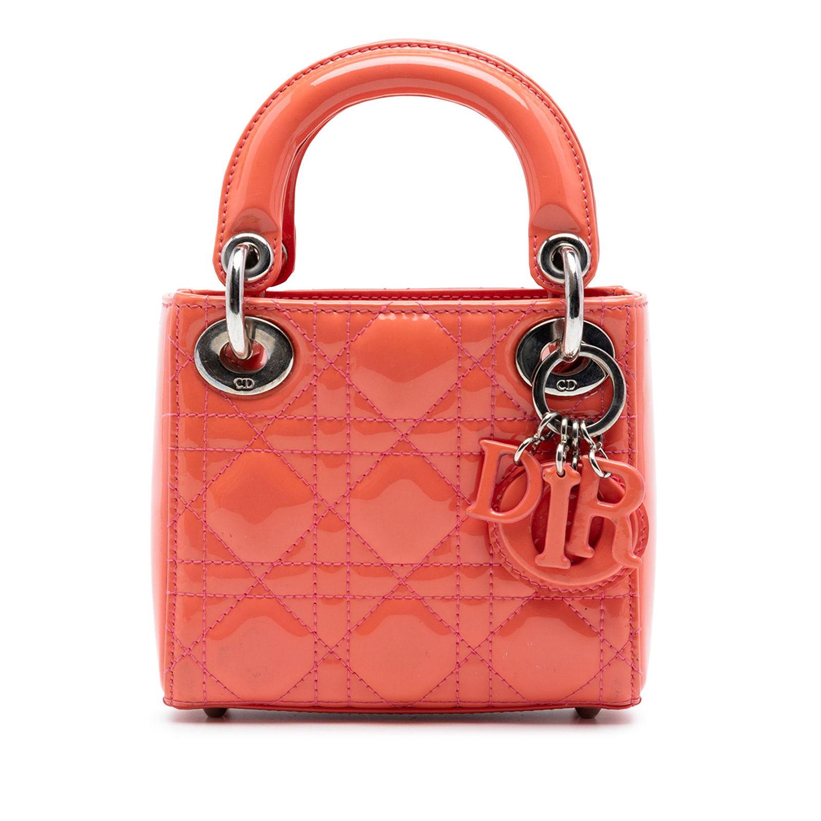 Dior Micro Patent Cannage Lady handbag Pink Leather: Dior Micro Patent Cannage Lady handbag Pink Leather This Lady Dior Micro Patent Cannage bag is crafted from quilted patent leather in a pink hue, featuring flat leather top handles and a fold-in flap 