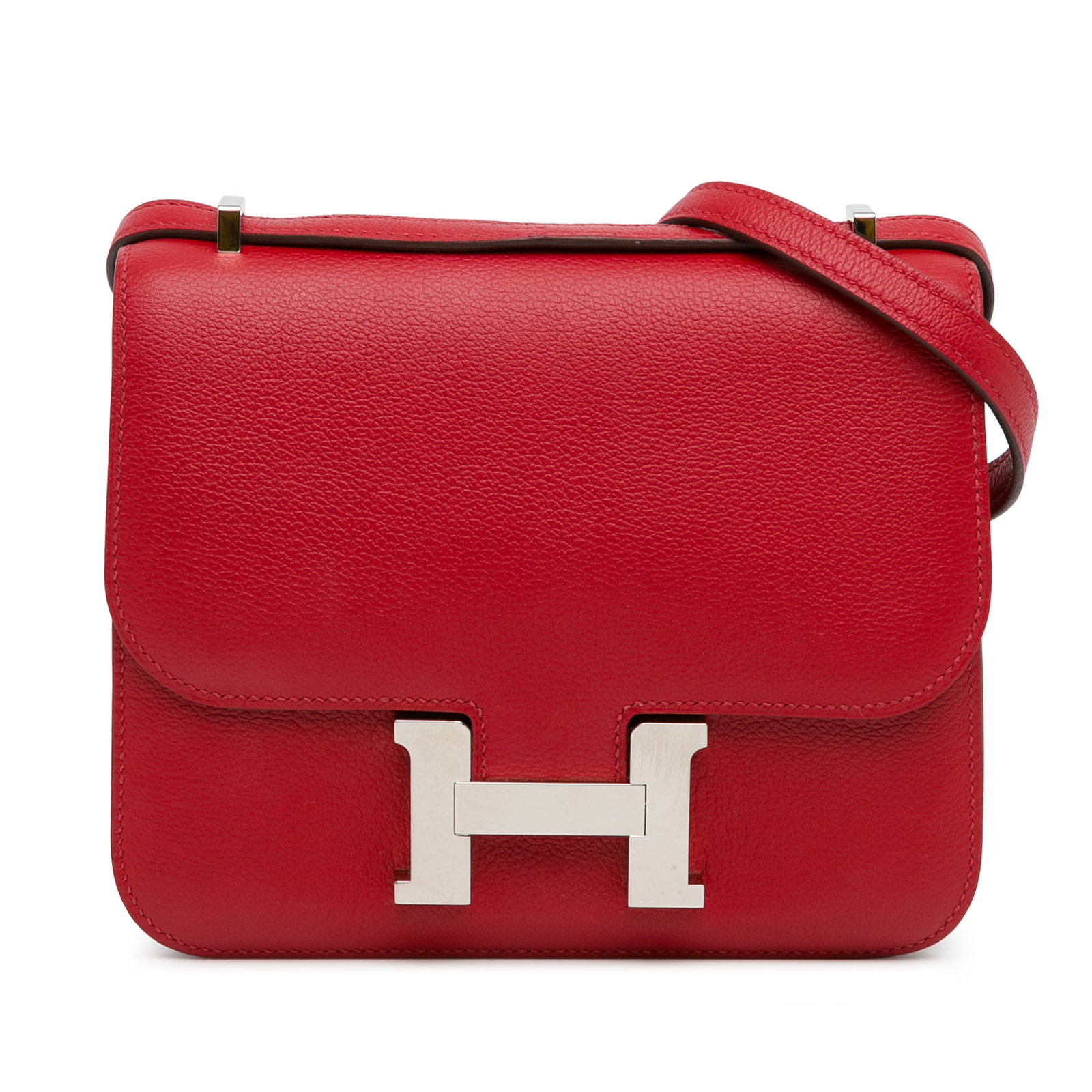 Hermes Mini Evercolor Constance 18 Rouge Casaque Leather Bag: Hermes Mini Evercolor Constance 18 Rouge Casaque Leather Bag The Hermes Mini Evercolor Constance 18 is a stylish handbag crafted from Evercolor leather in a vibrant Rouge Casaque color. This elegant b