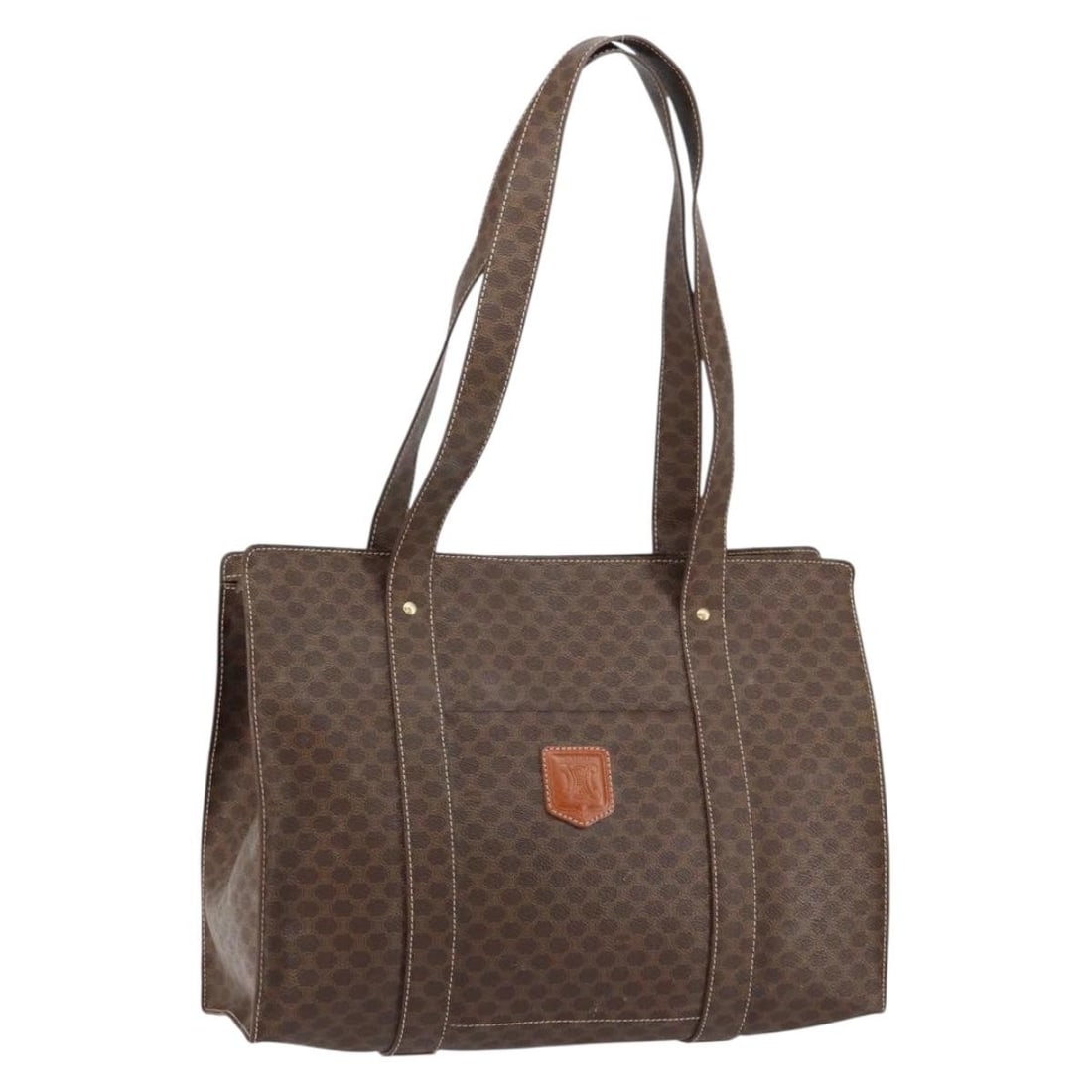 Celine Vintage Macadam Canvas Tote Bag Brown 29cm by 28cm by 12cm: Celine Vintage Macadam Canvas Tote Bag Brown 29cm by 28cm by 12cm This vintage Celine Macadam tote bag is crafted from brown canvas, designed for women. It features a spacious interior with minor sign