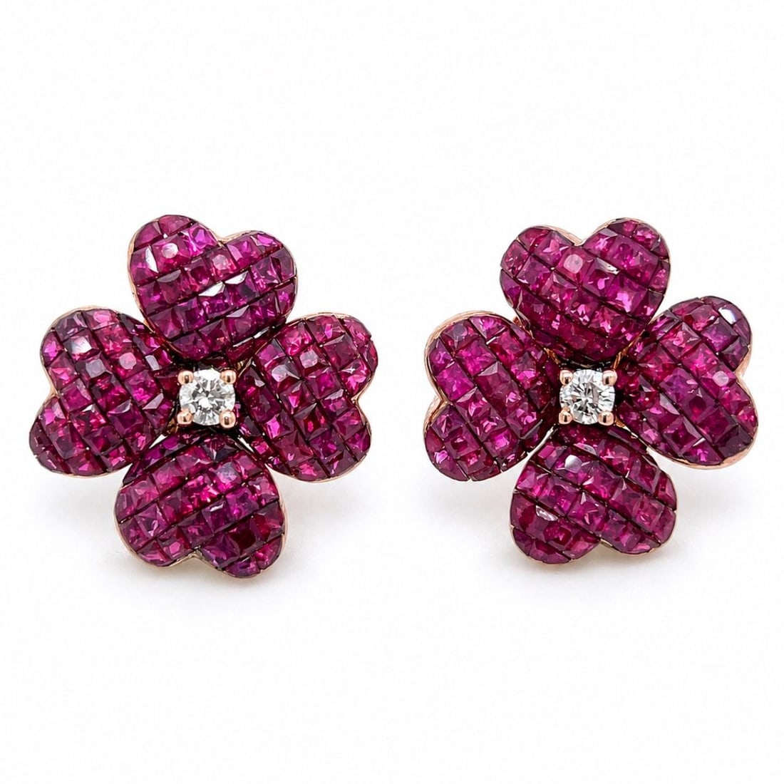 Ruby Diamond Earrings 18K Rose Yellow Gold 0.75 inches: Ruby Diamond Earrings 18K Rose Yellow Gold 0.75 inches These elegant earrings are crafted from 18K rose and yellow gold, featuring a vibrant array of 208 rubies with a total approximate weight of 10.0