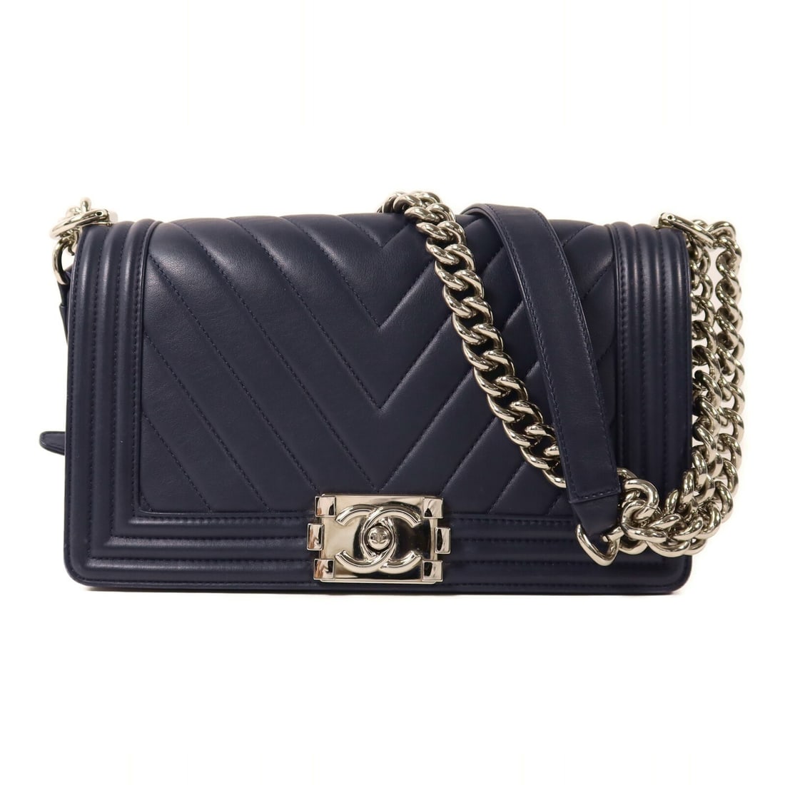 Chanel Boy 20 Navy Calfskin Leather Shoulder Bag with Silver Hardware: Chanel Boy 20 Navy Calfskin Leather Shoulder Bag with Silver Hardware This CHANEL Boy 20 chain shoulder bag features a navy calfskin leather exterior with silver-tone hardware. Designed for women, the