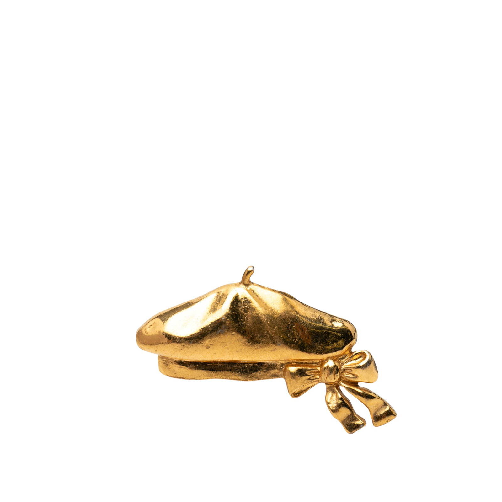Chanel Metal Brooch in Gold Tone Beret Hat Design: Chanel Metal Brooch in Gold Tone Beret Hat Design This Chanel brooch features a gold-plated metal design in the shape of a beret hat and is finished with a back pin closure. Made in France, this piece