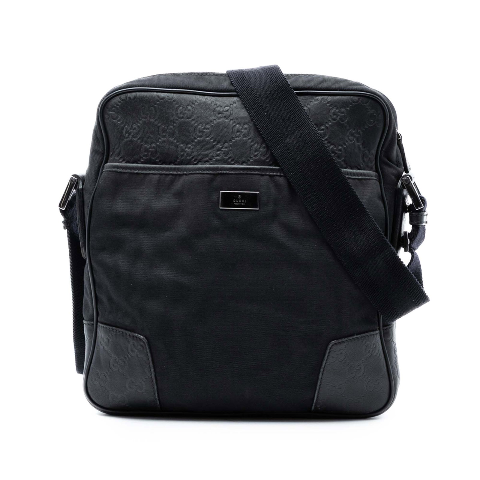 Gucci black nylon crossbody with Guccissima leather trim: Gucci black nylon crossbody with Guccissima leather trim This Gucci Guccissima Trimmed Nylon Crossbody bag is crafted from black nylon with embossed leather trim. It features an adjustable flat canvas