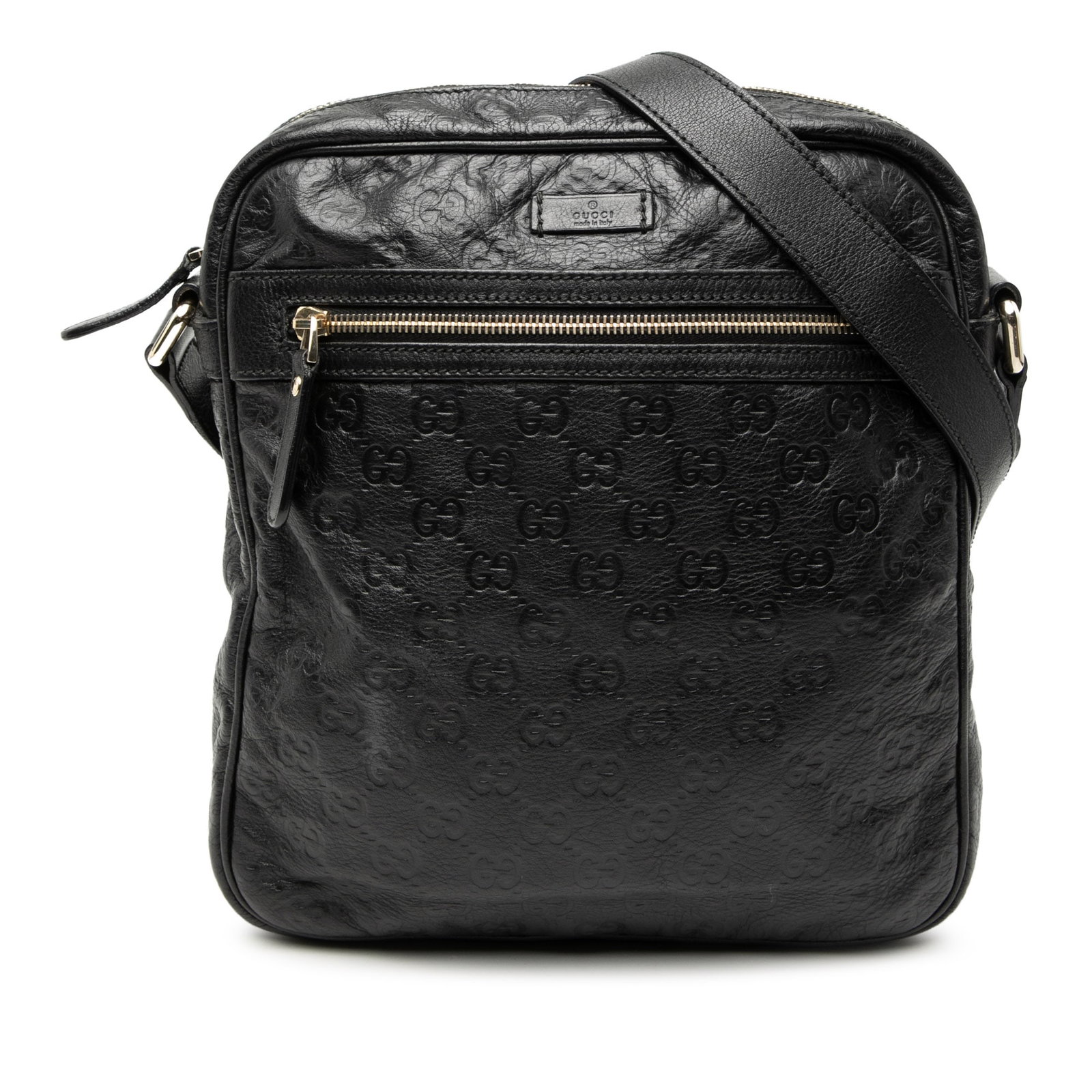 Gucci Guccissima Black Leather Crossbody Bag: Gucci Guccissima Black Leather Crossbody Bag This Guccissima Crossbody bag showcases a black leather body with an adjustable flat leather strap. It features a top zip closure, a front exterior zip poc