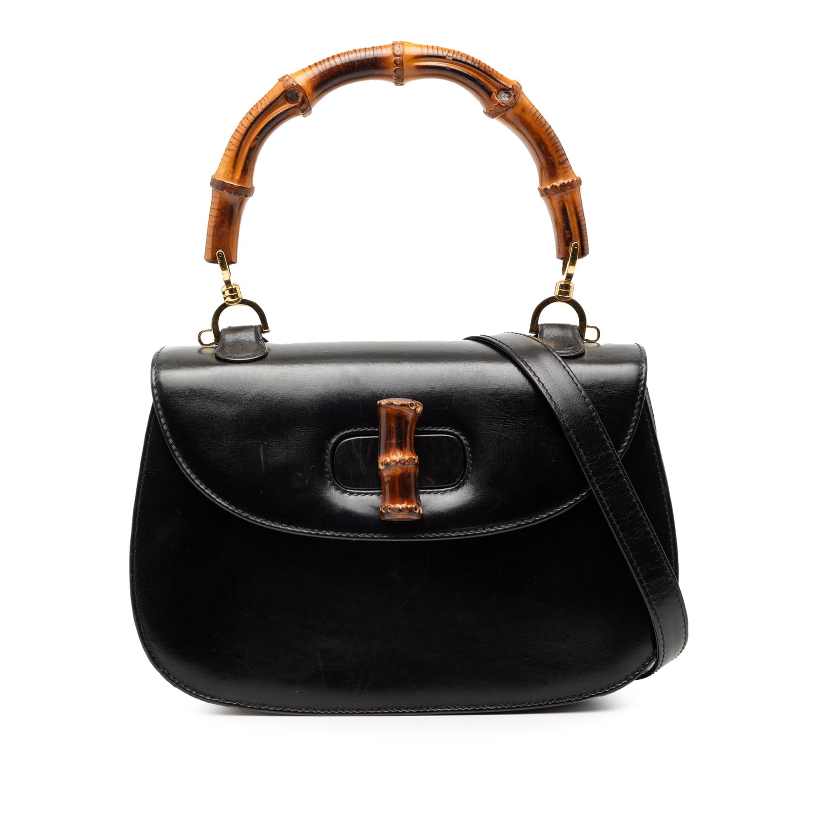 Gucci Bamboo Night Black Leather Handbag with Bamboo Top Handle: Gucci Bamboo Night Black Leather Handbag with Bamboo Top Handle This Gucci Calfskin Bamboo Night bag features a black leather body, a distinctive bamboo top handle, and a detachable flat leather shoul