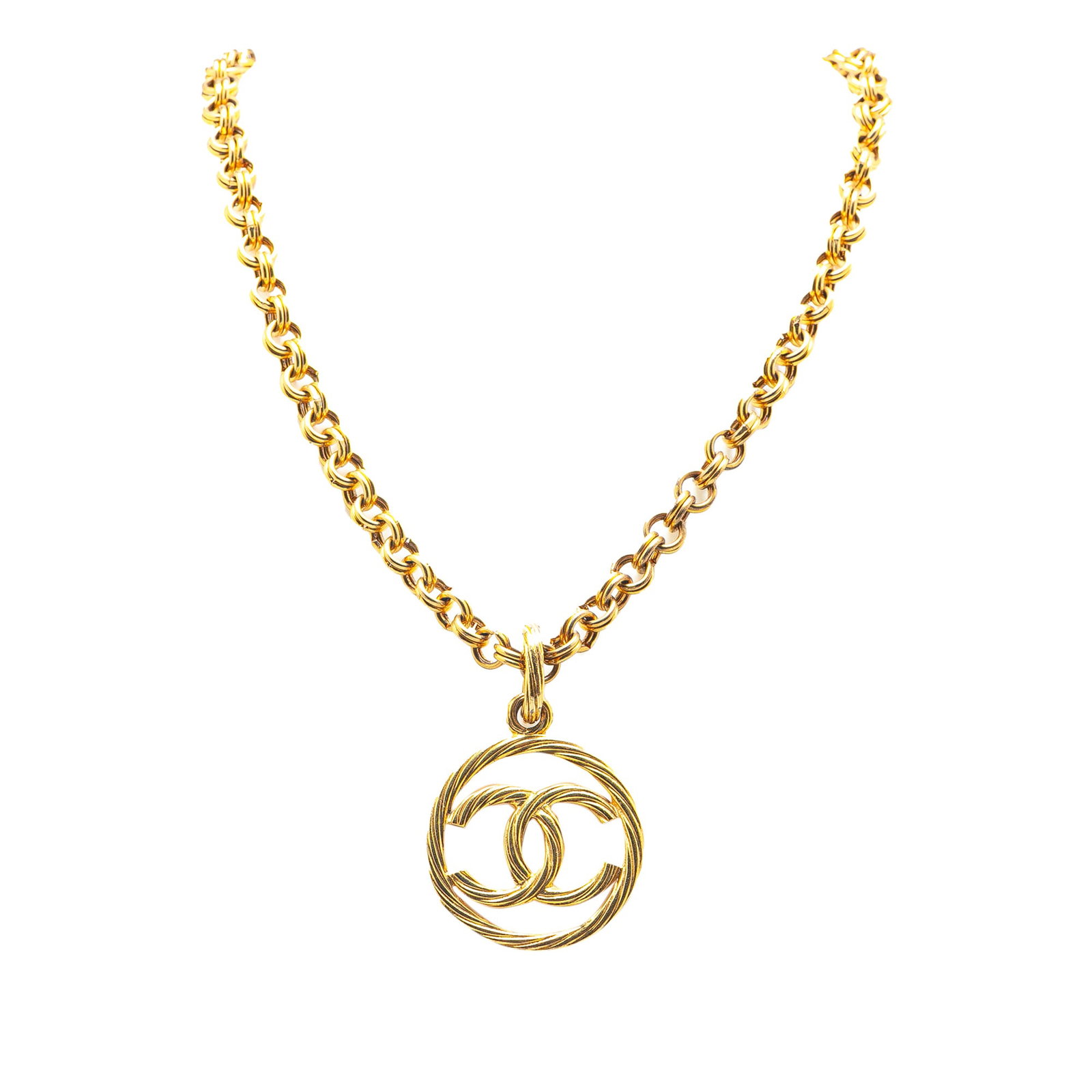 Chanel CC Tornado Gold Tone Pendant Necklace: Chanel CC Tornado Gold Tone Pendant Necklace This Chanel necklace features a gold-tone metal pendant with the iconic CC Tornado design, suspended from a matching gold-tone chain. It is secured with a 