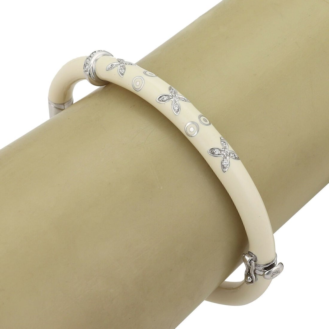 Nouvelle Bague 18k White Gold Sterling Diamond Enamel Bangle Bracelet: Nouvelle Bague 18k White Gold Sterling Diamond Enamel Bangle Bracelet This Nouvelle Bague bangle bracelet features a sophisticated blend of 18k white gold and 925 sterling silver, highlighted by elega