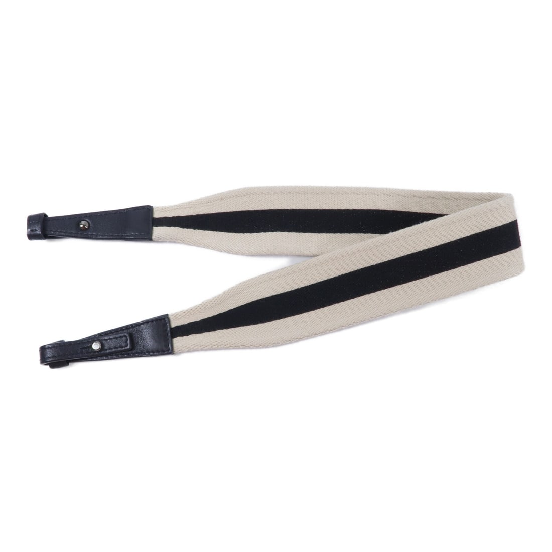 Delvaux calfskin canvas shoulder strap black white: Delvaux calfskin canvas shoulder strap black white This Delvaux shoulder strap is crafted from a combination of calfskin leather and canvas in a classic black and white color scheme. Designed for wome