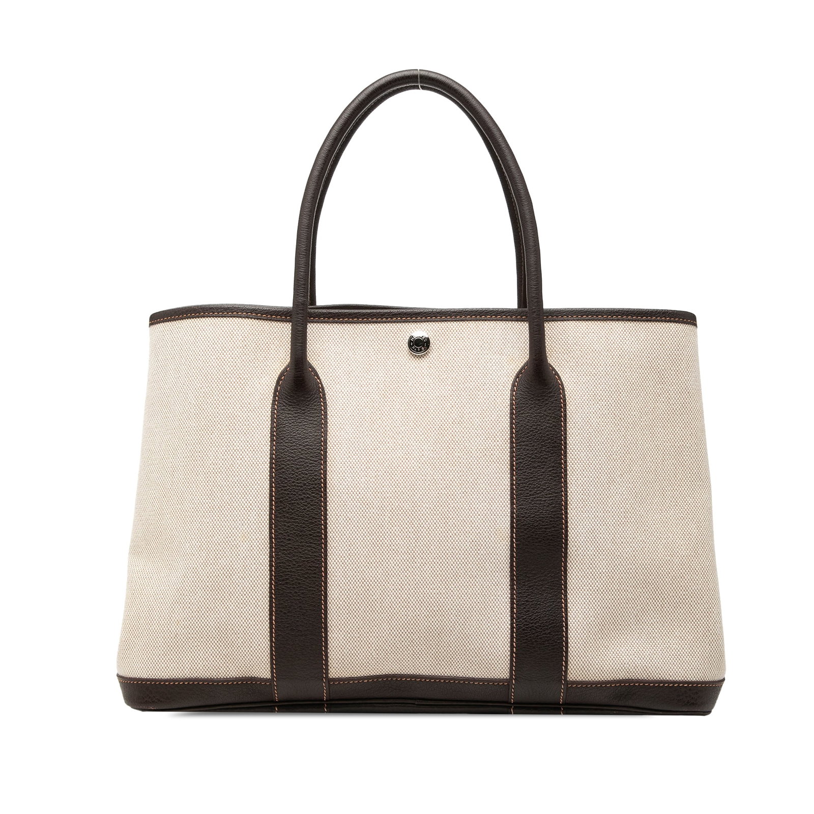 Hermes Garden Party 36 Beige Canvas Tote: Hermes Garden Party 36 Beige Canvas Tote This Hermes Garden Party 36 bag features a beige canvas body accented with Negonda leather trim and rolled leather handles. It has an open top secured by a sna