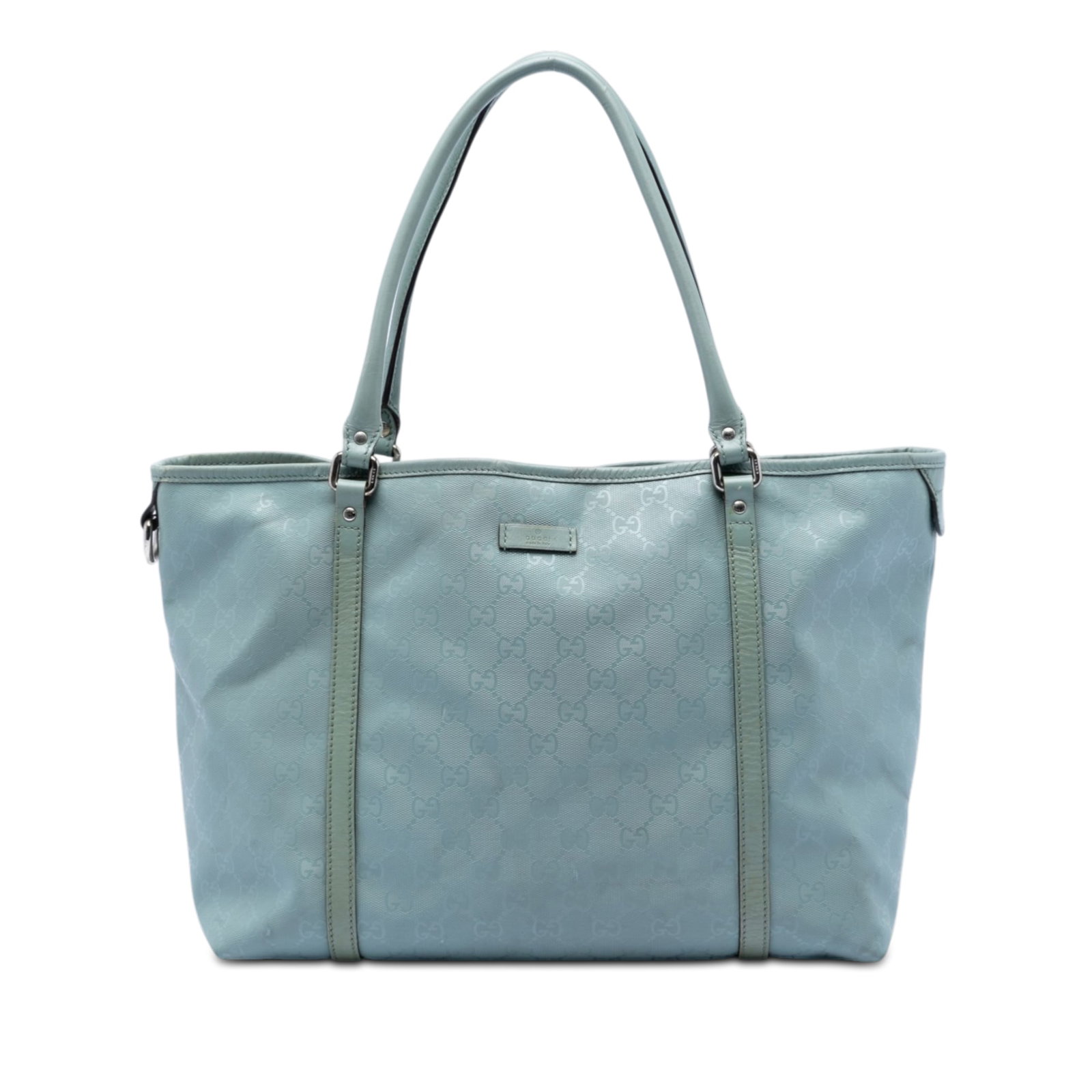 Blue GG Imprime Joy Tote Handbag with Leather Trim by Gucci: Blue GG Imprime Joy Tote Handbag with Leather Trim by Gucci This Gucci Medium GG Imprime Joy Tote features a coated canvas body with leather trim, rolled leather handles, an open top with magnetic sna
