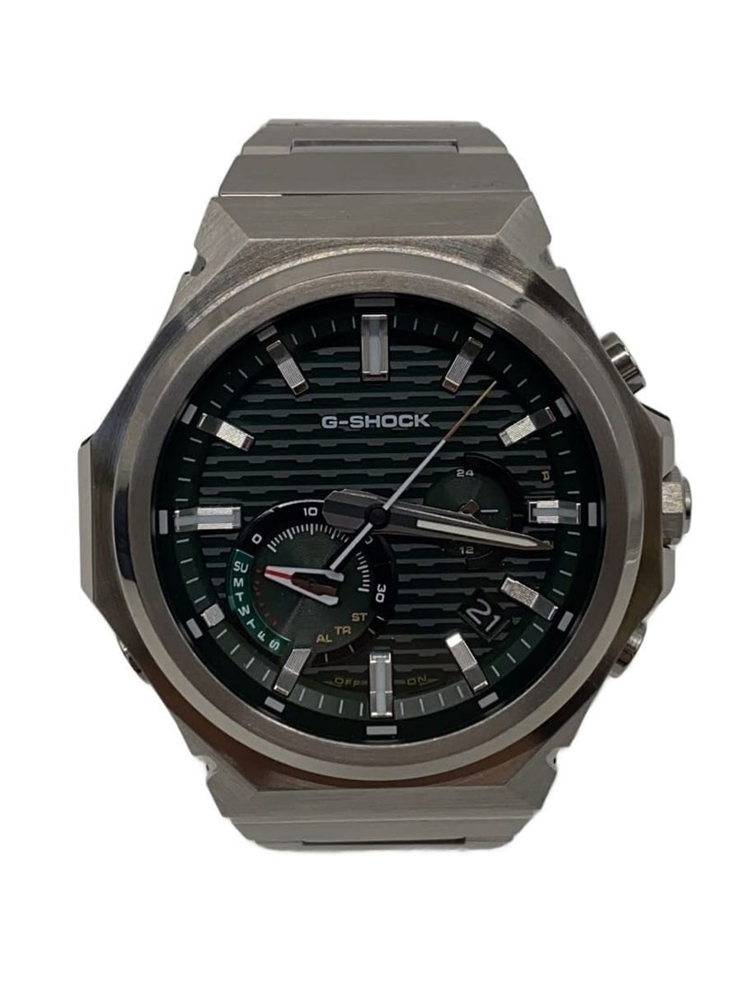 Green CASIO G-SHOCK GST-B1000D-3AJF Men's Wristwatch: Green CASIO G-SHOCK GST-B1000D-3AJF Men's Wristwatch This CASIO G-SHOCK GST-B1000D-3AJF men's wristwatch features a durable design with a green color scheme. Made in Japan, this pre-owned watch is in 