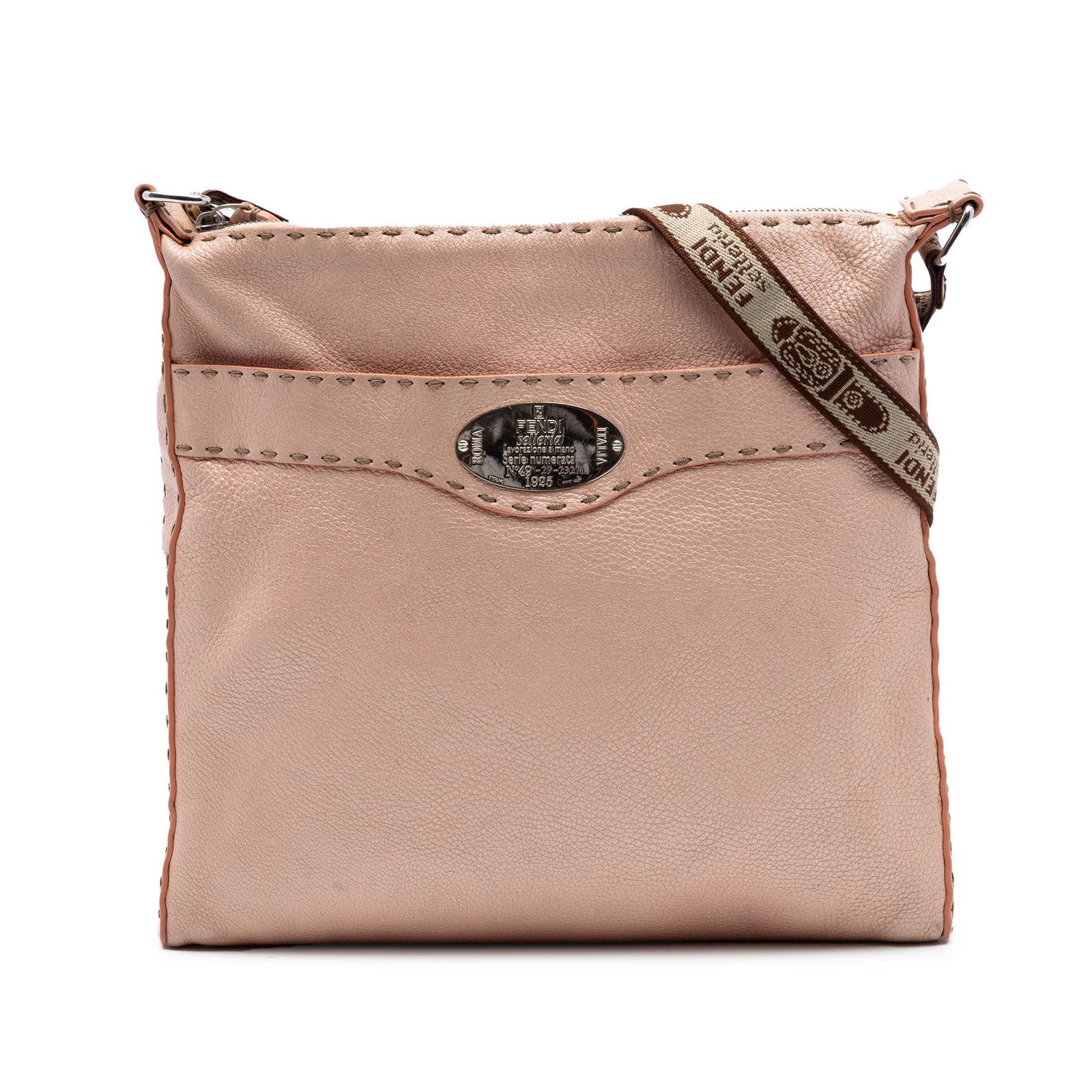 Fendi Selleria pink leather crossbody bag: Fendi Selleria pink leather crossbody bag This Fendi Selleria crossbody bag is crafted from pink leather and features an adjustable flat strap, a top zip closure, an exterior slip pocket, and an inter