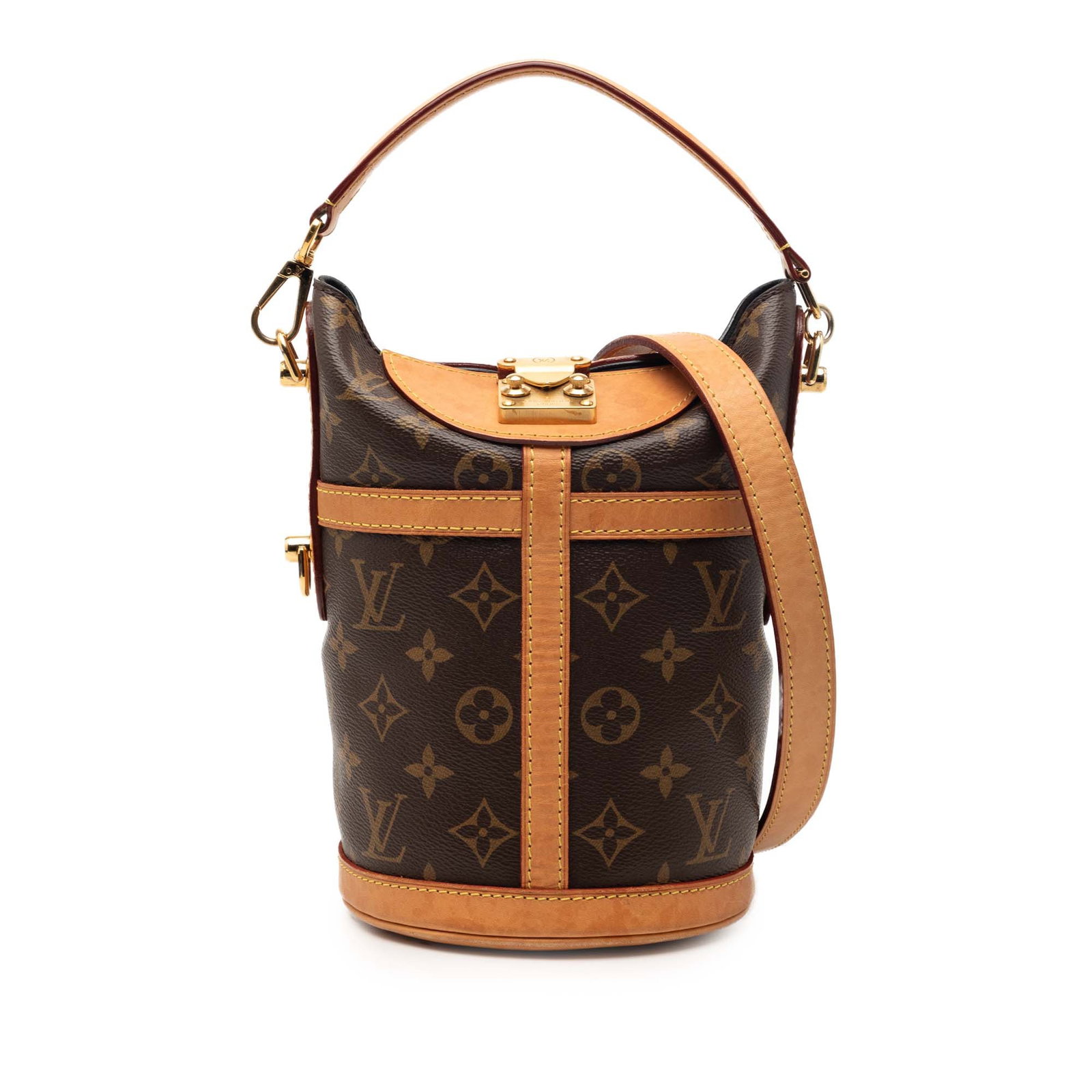 Louis Vuitton Monogram Canvas Bucket Bag with Vachetta Leather Trim: Louis Vuitton Monogram Canvas Bucket Bag with Vachetta Leather Trim This Louis Vuitton Monogram Duffle Bucket Bag features the iconic monogram canvas body with vachetta leather trim, a flat vachetta l