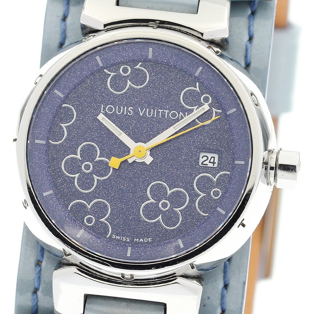 Louis Vuitton Tambour Q121B Quartz Date Wristwatch: Louis Vuitton Tambour Q121B Quartz Date Wristwatch This pre-owned Louis Vuitton Tambour Quartz women's wristwatch features a stainless steel case and a leather/enamel strap. The watch has a purple dia