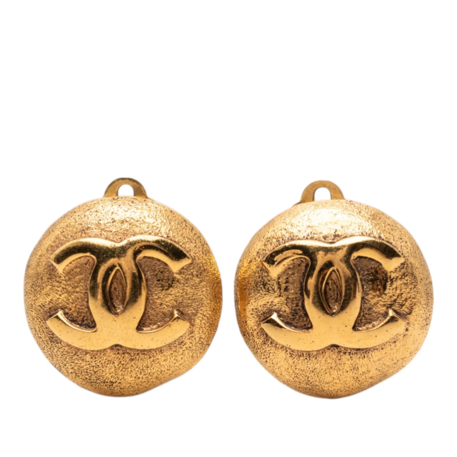 Chanel CC Logo Gold Plated Metal Clip On Button Earrings: Chanel CC Logo Gold Plated Metal Clip On Button Earrings These Chanel CC button earrings feature gold-plated metal bodies with clip-on closures. The earrings are from the costume jewelry collection an