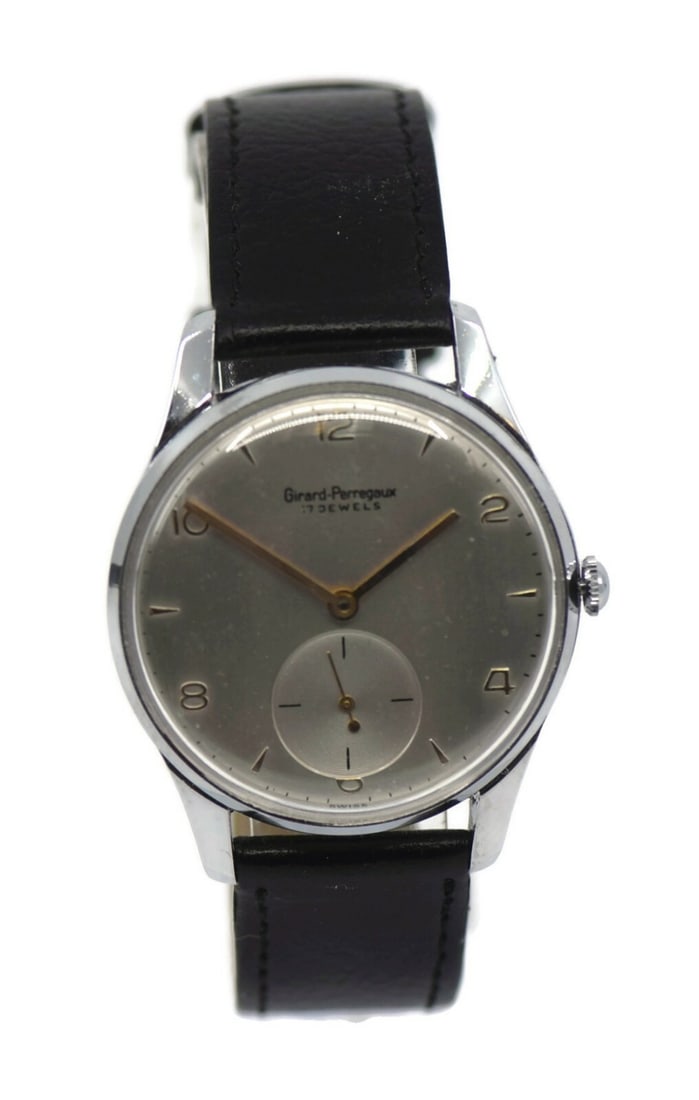 Girard Perregaux Vintage Mechanical Stainless Steel Wristwatch: Girard Perregaux Vintage Mechanical Stainless Steel Wristwatch This Girard Perregaux Vintage Stainless Steel Watch features a classic silver dial, exuding an antique vintage style. It boasts a sturdy 