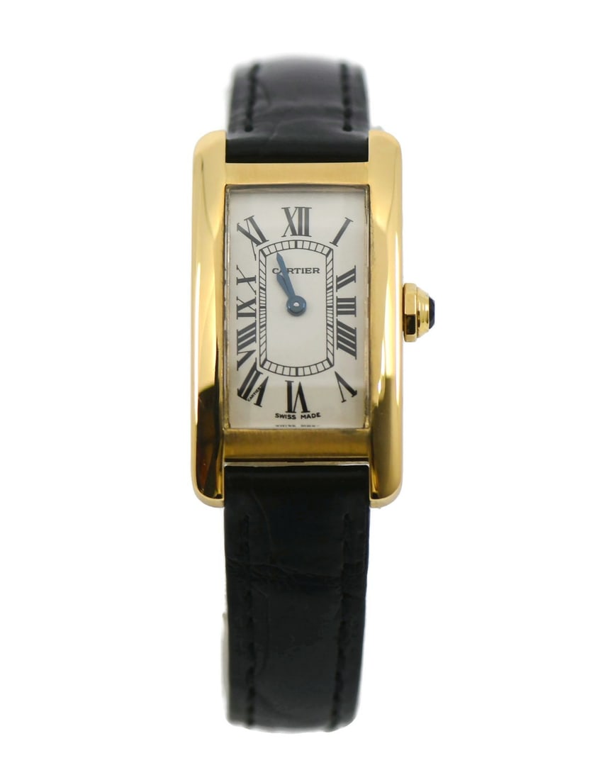 Cartier Tank American 18K Yellow Gold Wristwatch W2601556: Cartier Tank American 18K Yellow Gold Wristwatch W2601556 This Cartier Tank American wristwatch features a rectangular 18K yellow gold case measuring 19 x 33 mm. The watch is powered by a quartz movem