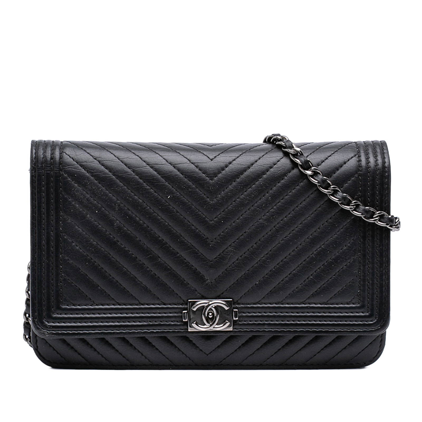 Black Lambskin Chevron Quilted Boy Wallet on Chain by Chanel: Black Lambskin Chevron Quilted Boy Wallet on Chain by Chanel This Chanel Chevron Lambskin Boy Wallet on Chain features a quilted lambskin leather body in black, complemented by a leather-woven chain s