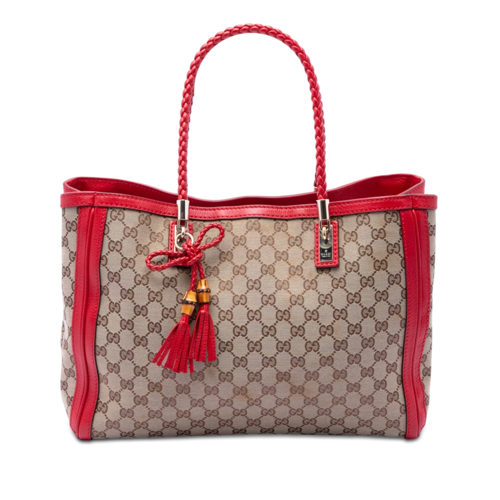 Gucci Bella Tote GG Canvas Leather Trim: Gucci Bella Tote GG Canvas Leather Trim This Gucci GG Canvas Bella Tote features a beige canvas body with leather trim and braided leather straps. The open top is secured with a lobster clasp closure.