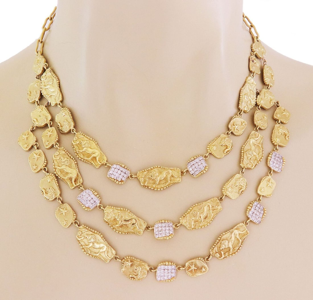 SeidenGang Athena 18k Yellow Gold Diamond Bib Necklace Lion Motifs: SeidenGang Athena 18k Yellow Gold Diamond Bib Necklace Lion Motifs This SeidenGang Athena necklace is expertly crafted from 18k yellow gold and showcases a striking triple-strand bib design. The neckl