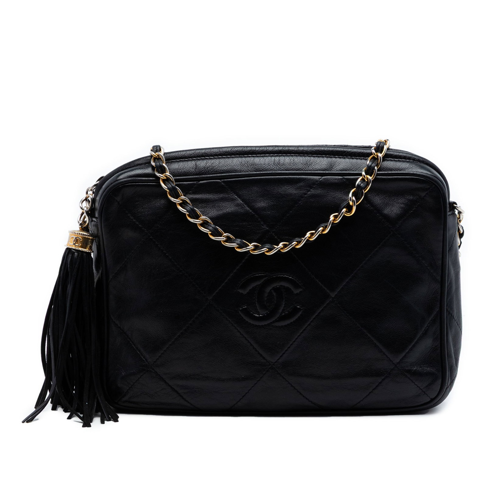 Chanel quilted lambskin crossbody camera bag with tassel: Chanel quilted lambskin crossbody camera bag with tassel This Chanel CC Quilted Lambskin Tassel Camera Bag is crafted from black quilted lambskin leather and features a leather-woven chain strap, a ta