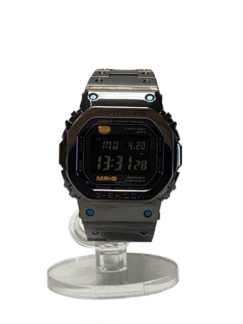 CASIO MRG-B5000BA-1JR Titanium G Shock Men's Wristwatch: CASIO MRG-B5000BA-1JR Titanium G Shock Men's Wristwatch This CASIO G-SHOCK MT-G MRG-B5000BA-1JR men's wristwatch features a striking blue-black design and is crafted from durable titanium. Made in Jap